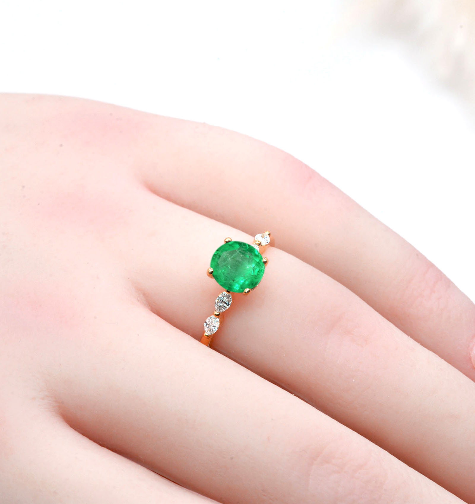 1.03ct emerald and diamond engagement ring