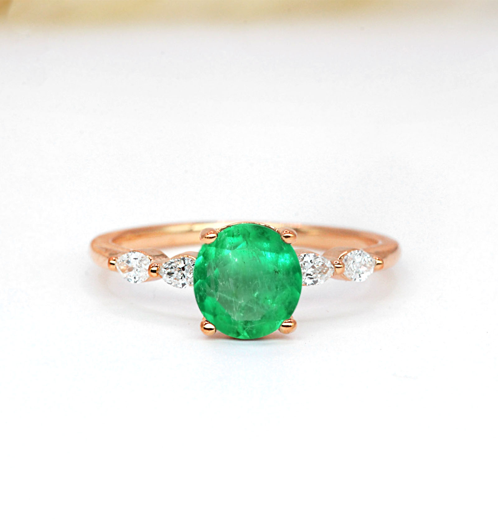 1.03ct emerald and diamond engagement ring