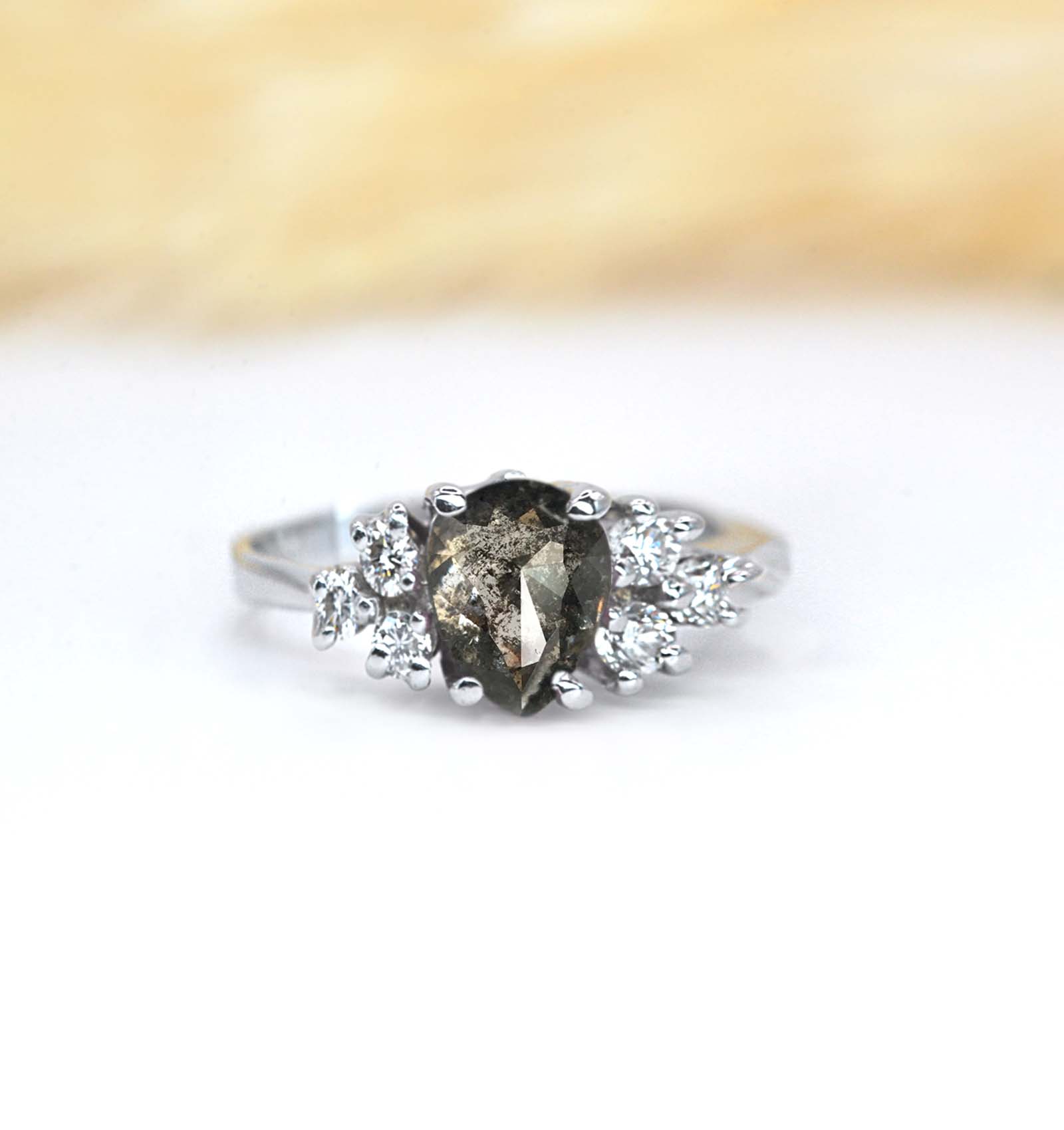1.5ct pear salt and pepper anniversary ring