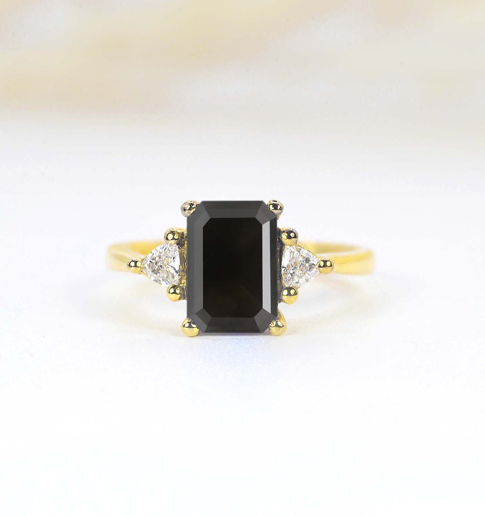 Natural black diamond and trilliant diamond ring