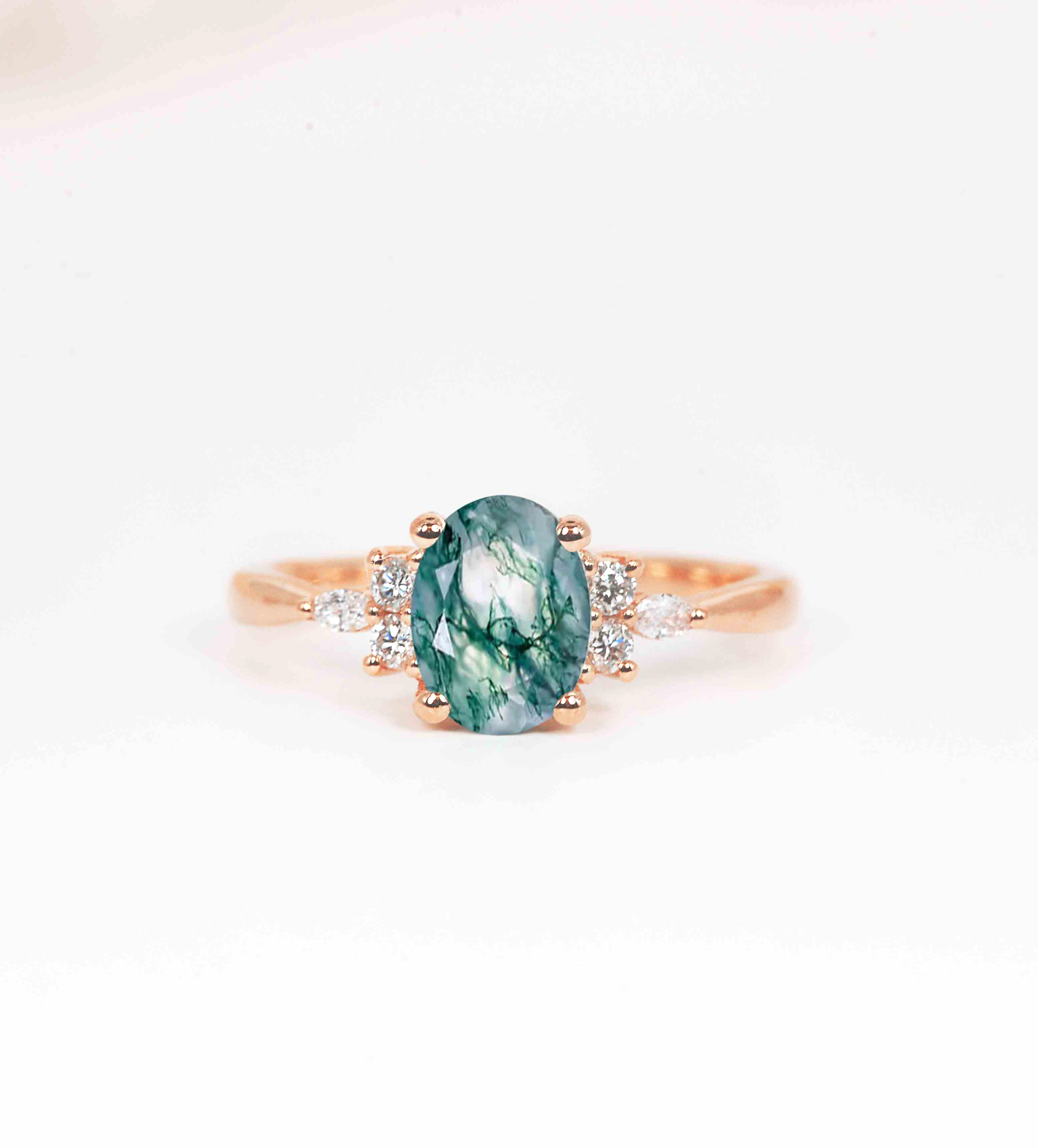 Oval cut moss agate brilliant ring