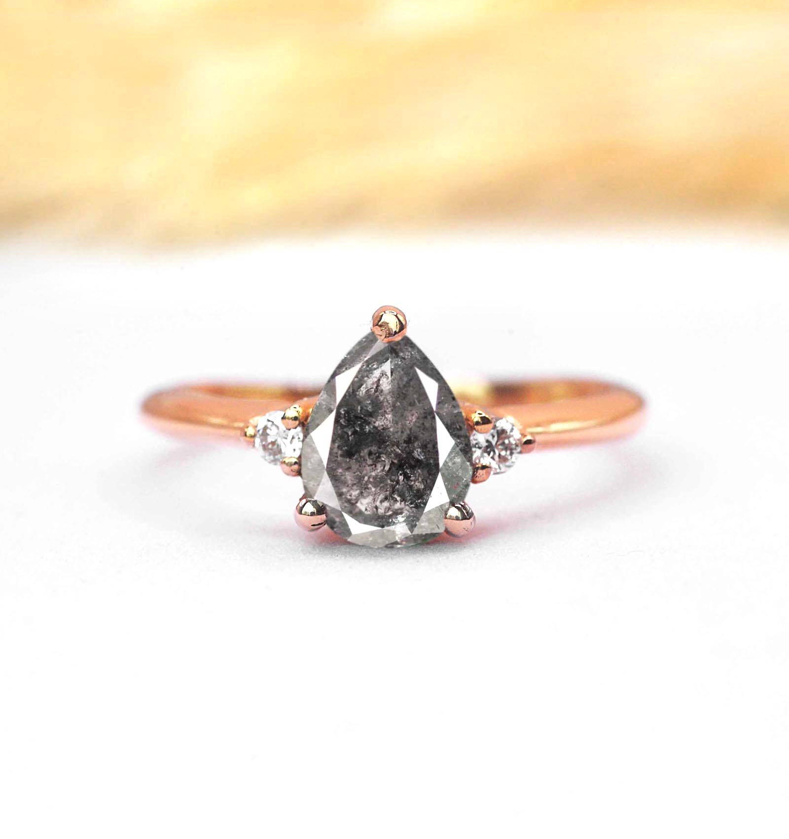 Pear cut galaxy diamond ring in rose gold