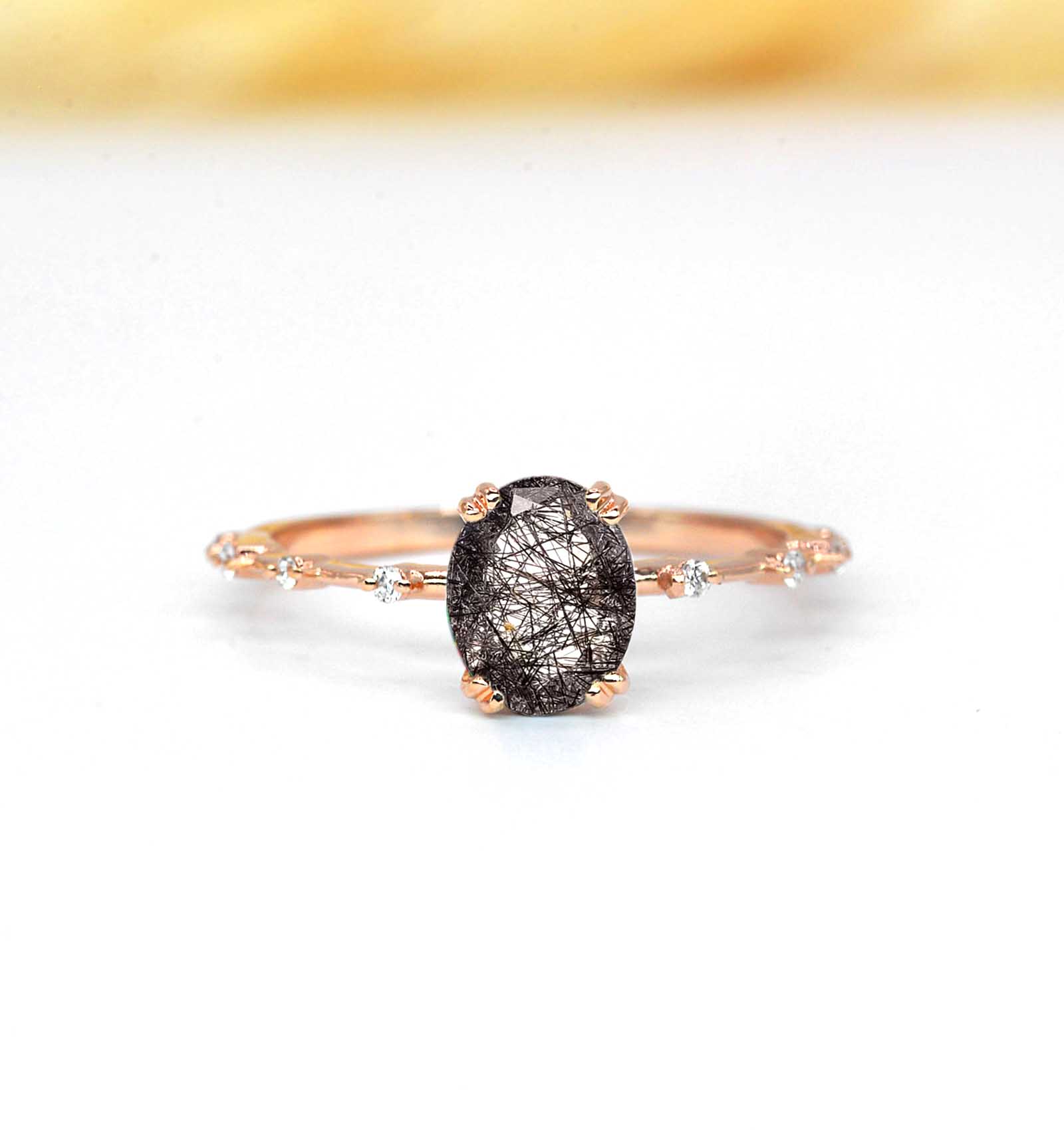 oval shape rutile engagement ring