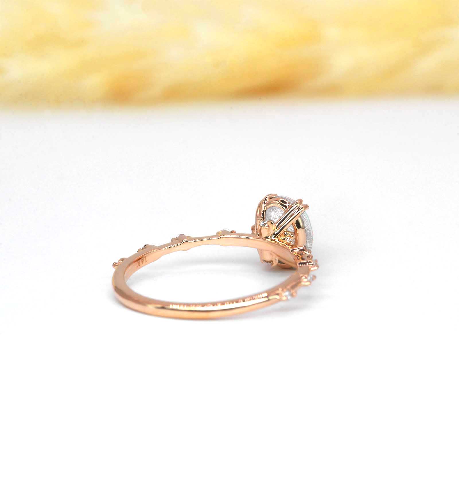 oval shape rutile anniversary ring