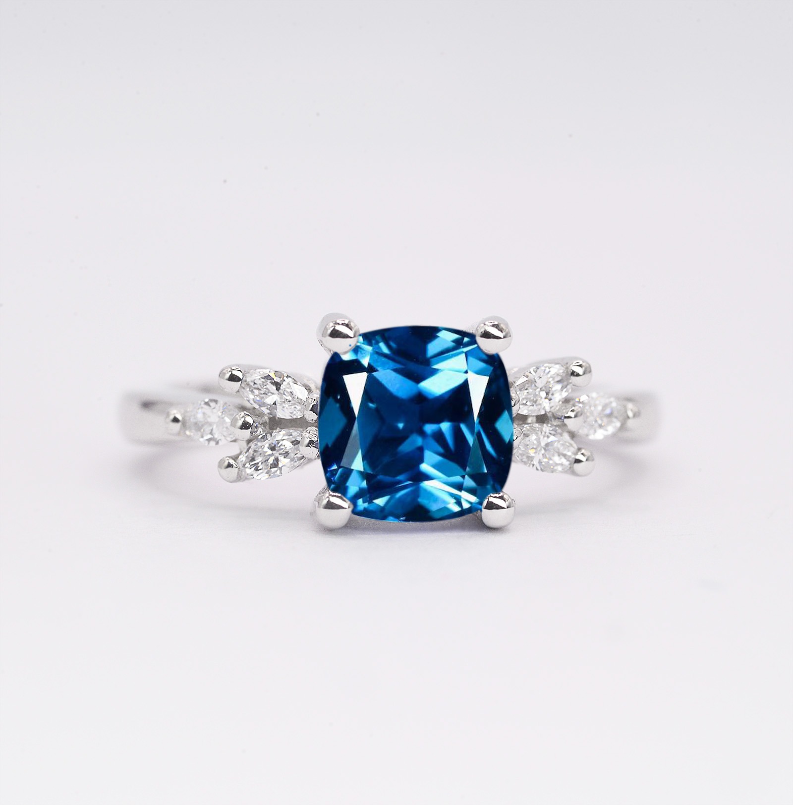 blue topaz brilliant engagement ring
