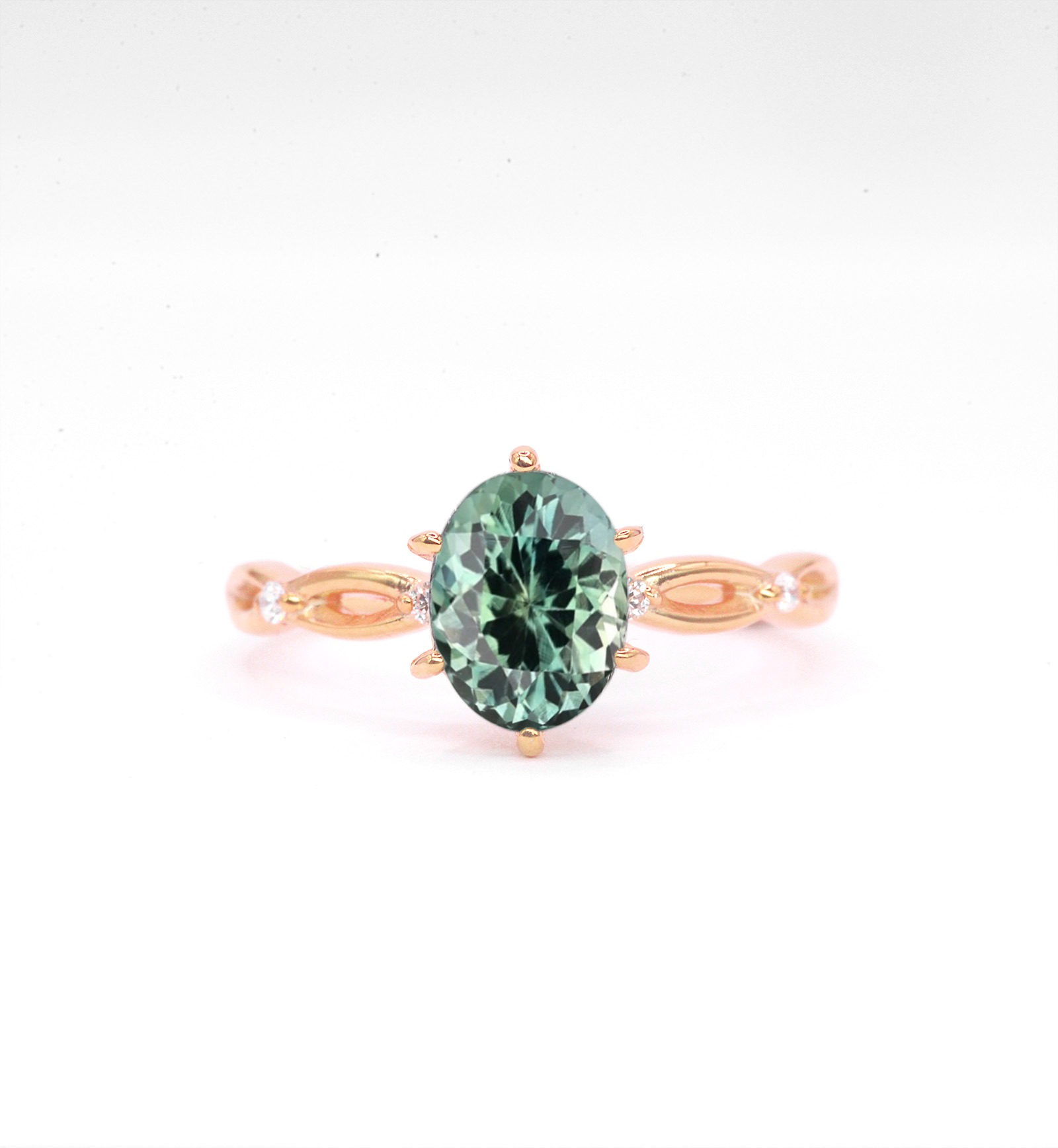This amazing 1.5ct teal sapphire and diamond ring comes with natural round diamonds. A unique art deco engagement ring for her.