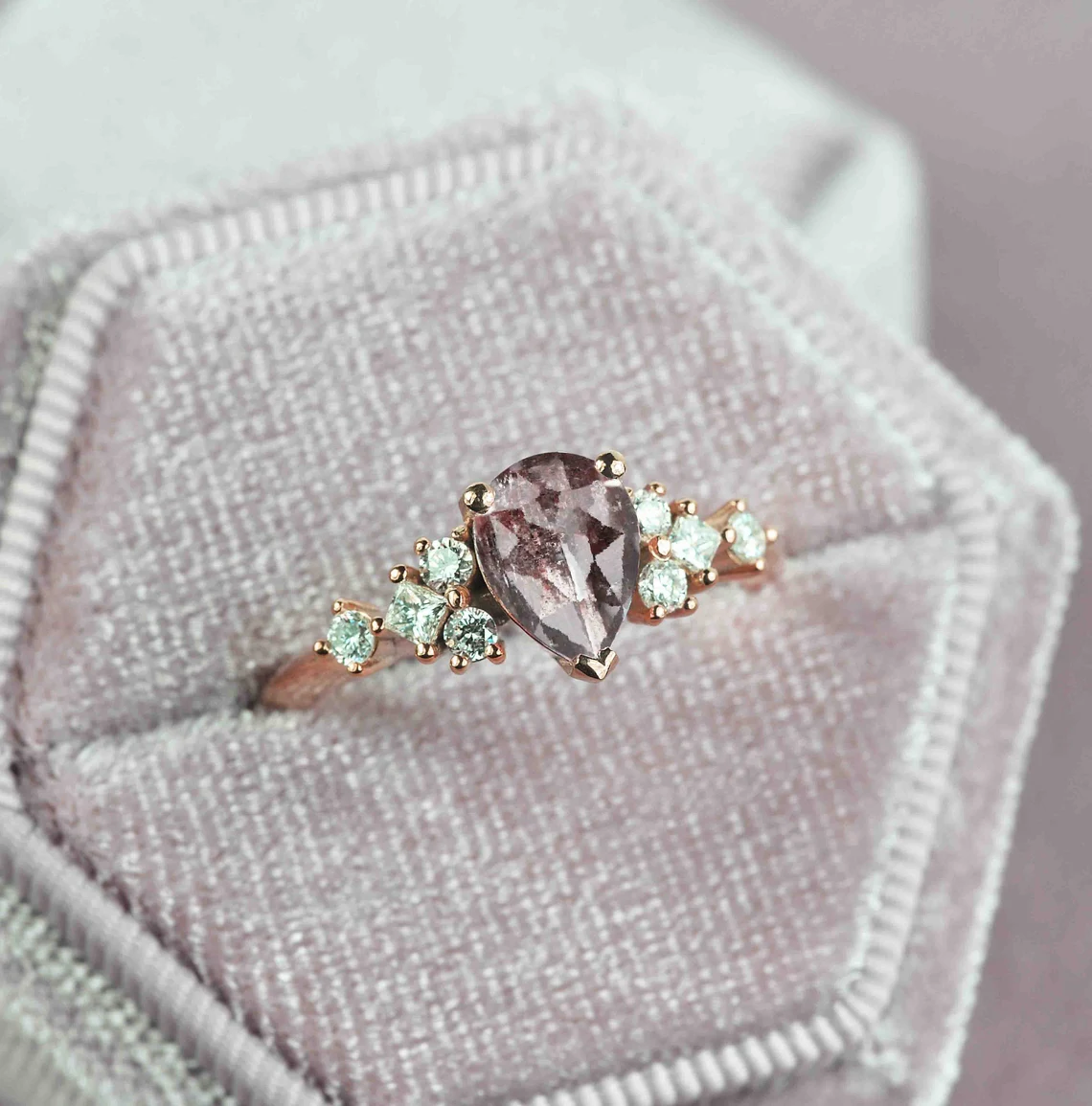 pear cut salt and pepper diamond ring with white accent diamonds. This unique art deco ring comes with solid 9k,14k or 18k rose gold.