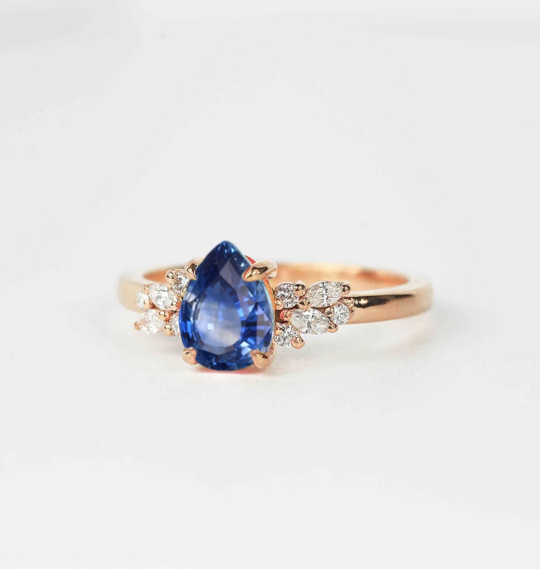 blue sapphire and diamond ring with black diamond and white accent diamonds. This unique art deco ring comes with solid 9k,14k or 18k rose gold.
