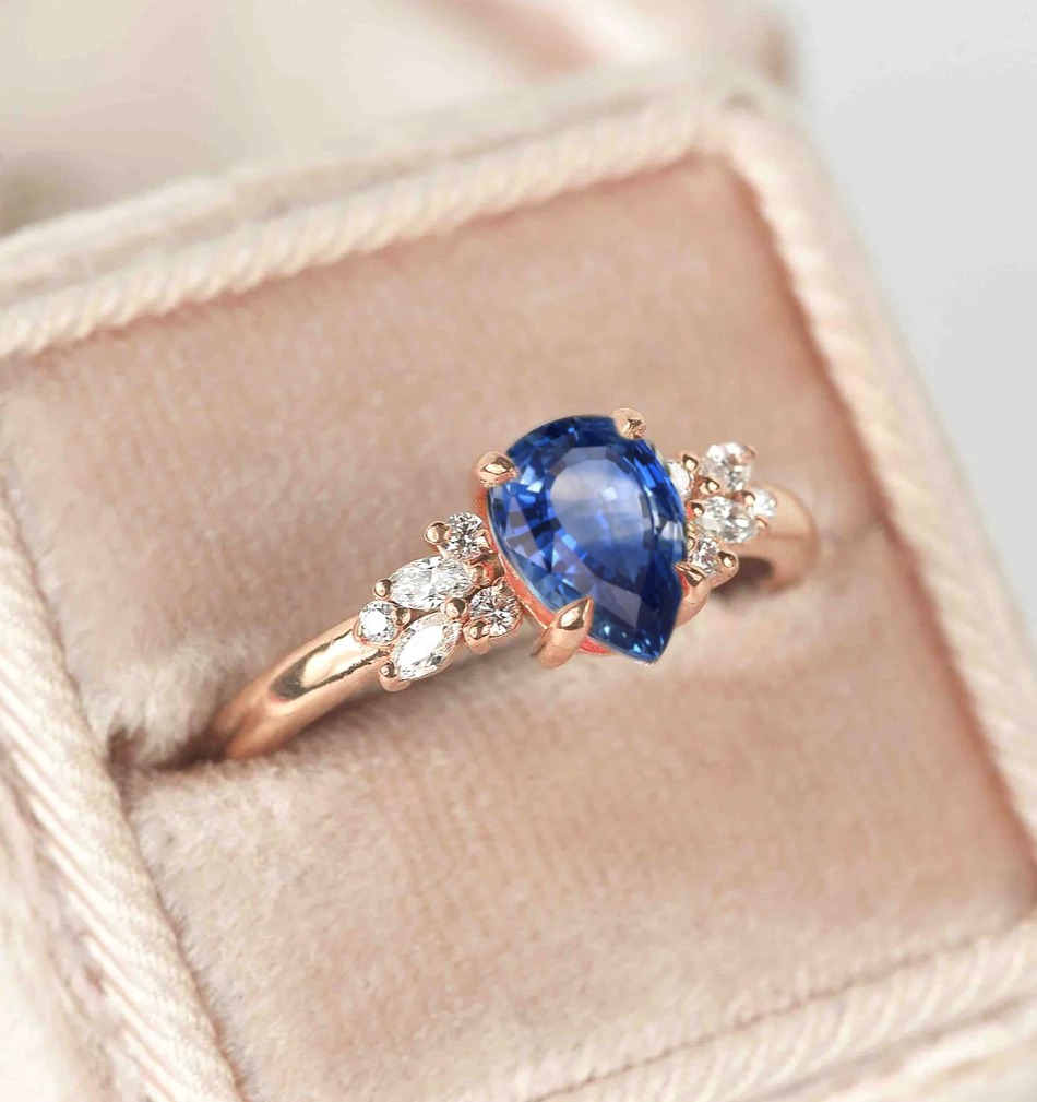 blue sapphire and diamond ring with black diamond and white accent diamonds. This unique art deco ring comes with solid 9k,14k or 18k rose gold.