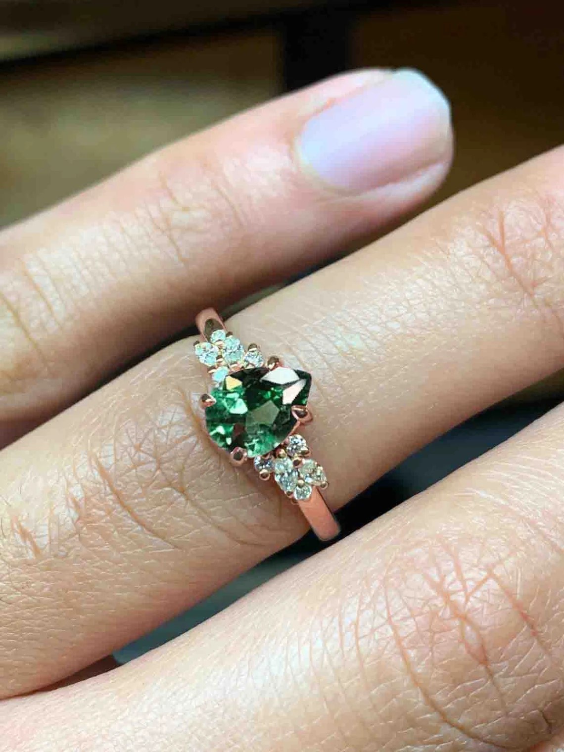 mint green sapphire diamond cluster ring with 8 x 6mm mint green sapphire and white accent diamonds. The unique design of this art deco style ring comes with solid 9k,14k or 18k gold or platinum.