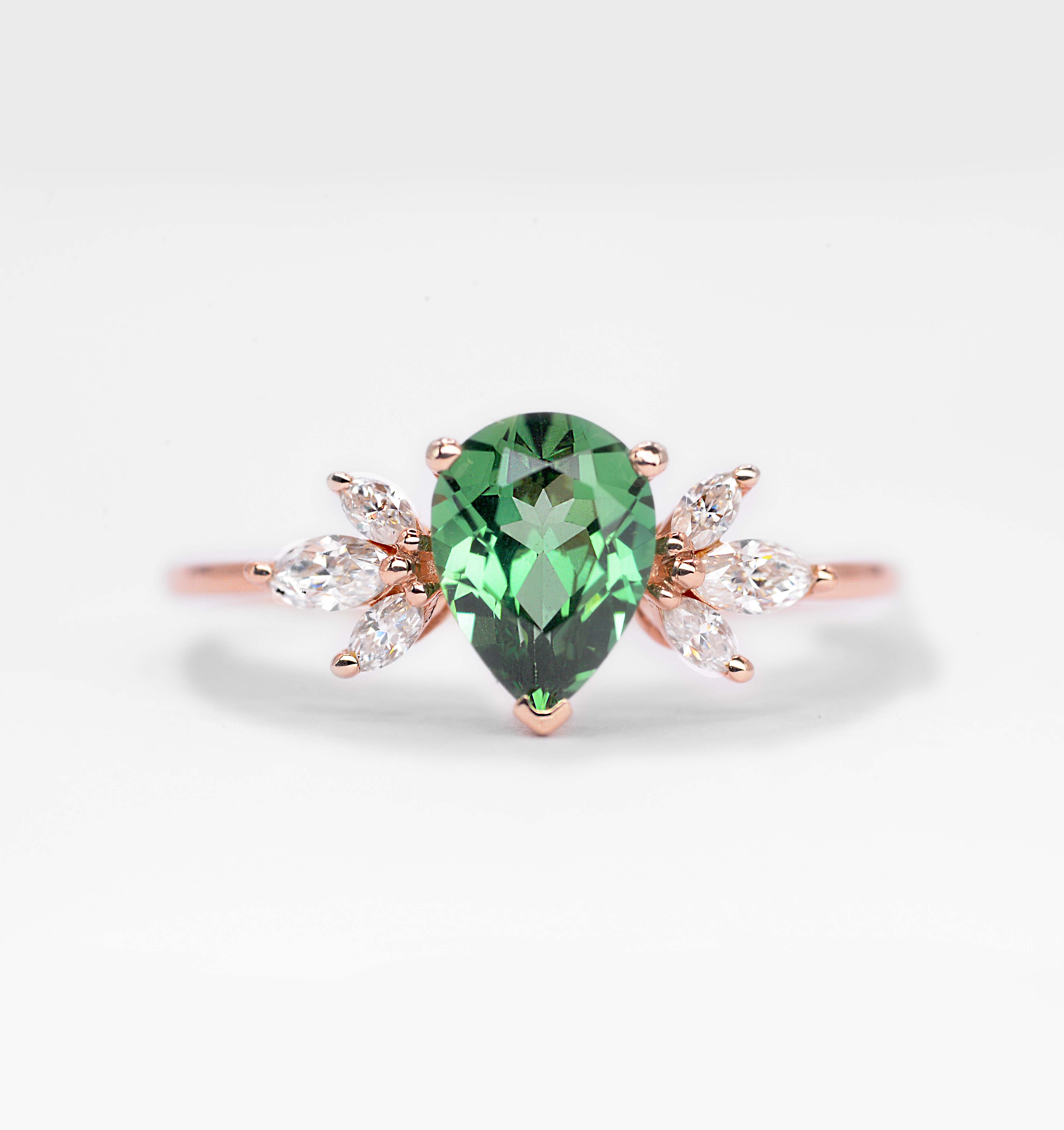 mint green sapphire and marquise diamond ring with 8 x 6mm peat cut mint green sapphire and white marquise diamonds. The unique design of this art deco style ring comes with solid 9k,14k or 18k gold or platinum.