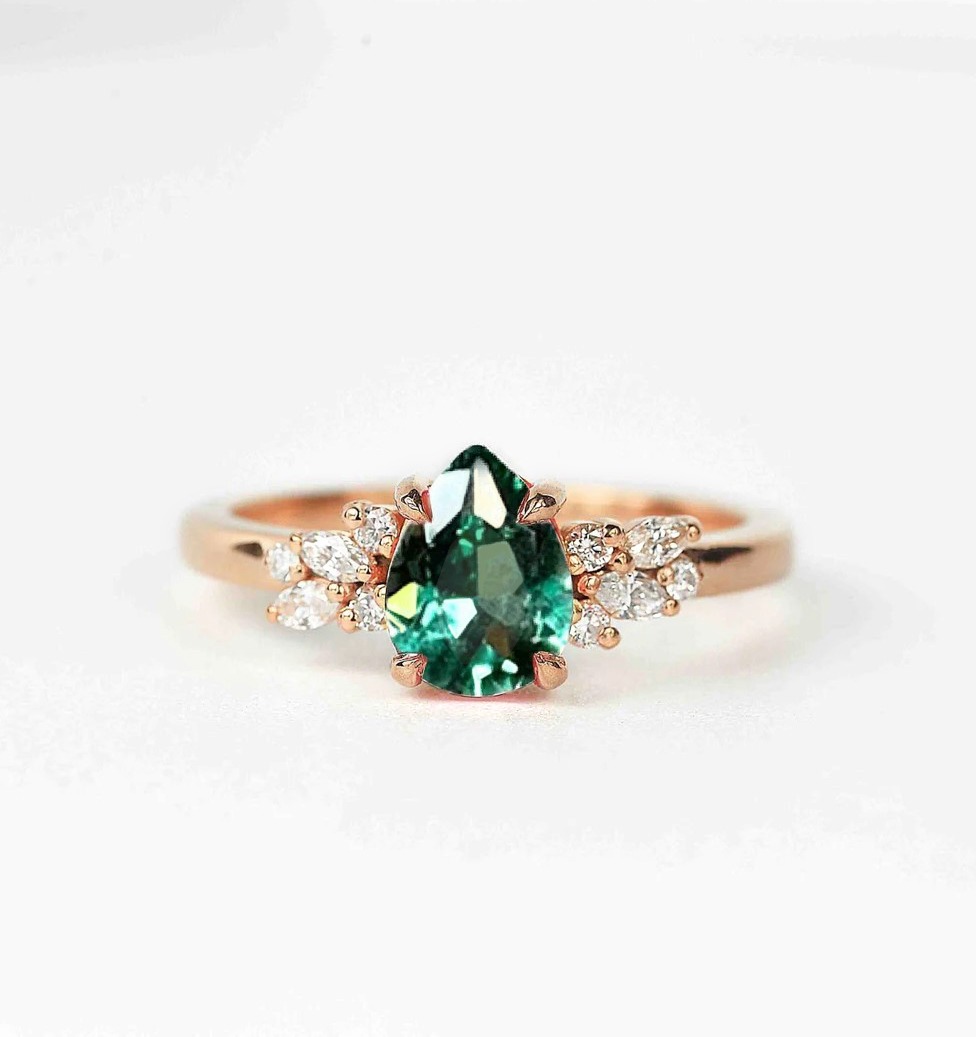 mint green sapphire diamond cluster ring with 8 x 6mm mint green sapphire and white accent diamonds. The unique design of this art deco style ring comes with solid 9k,14k or 18k gold or platinum.