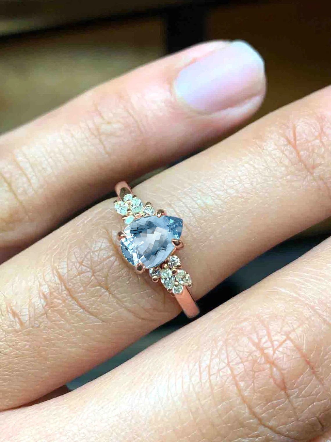 pear aquamarine and diamond ring with aquamarine and white accent diamonds. This unique art deco ring comes with solid 9k,14k or 18k rose gold.