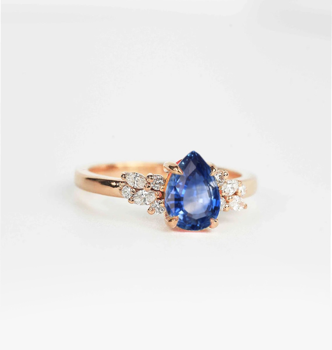 blue sapphire and diamond ring with black diamond and white accent diamonds. This unique art deco ring comes with solid 9k,14k or 18k rose gold.