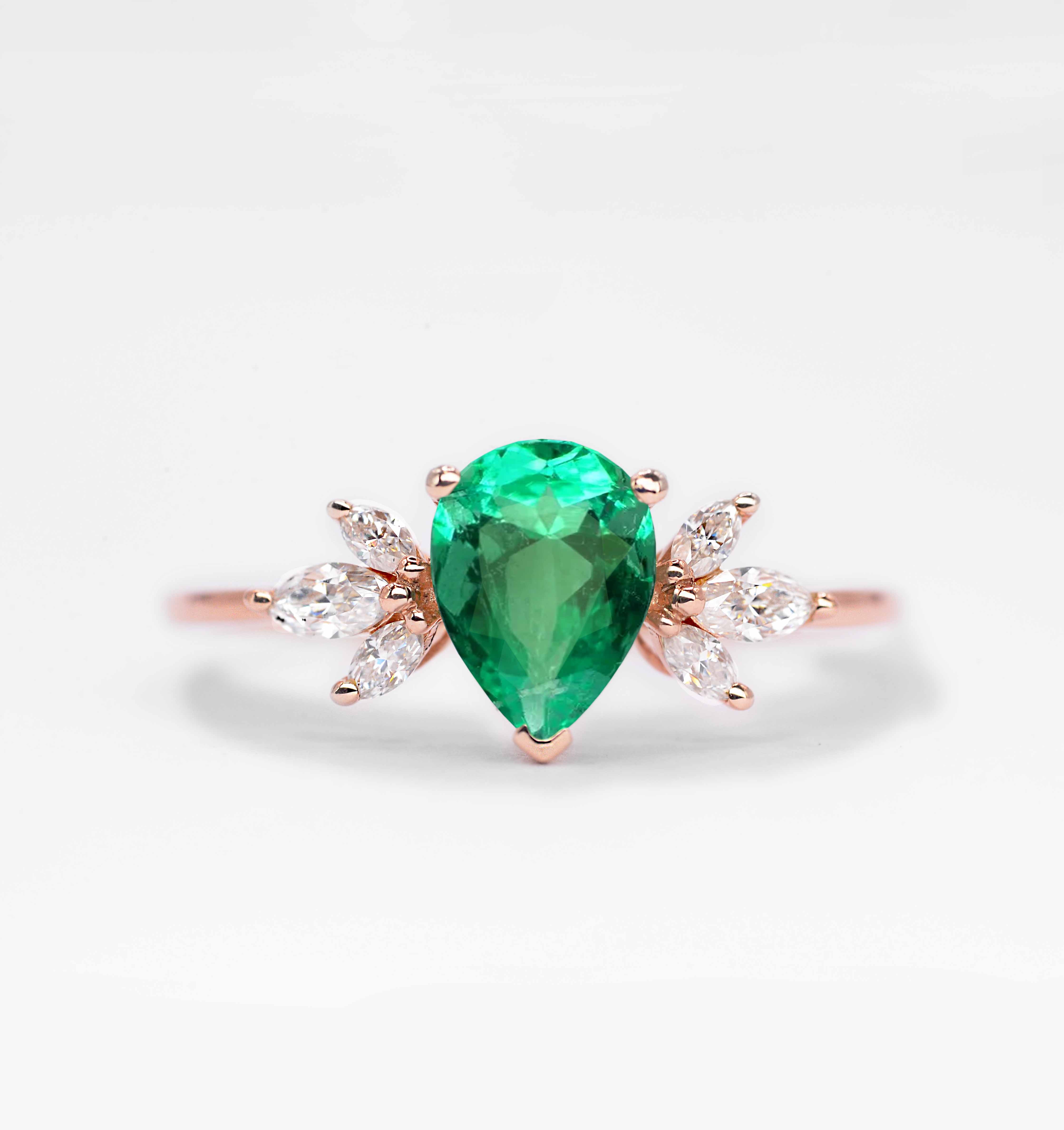 pear emerald and diamond bridal ring with emerald and white diamonds. This unique art deco ring comes with solid 9k,14k or 18k rose gold.