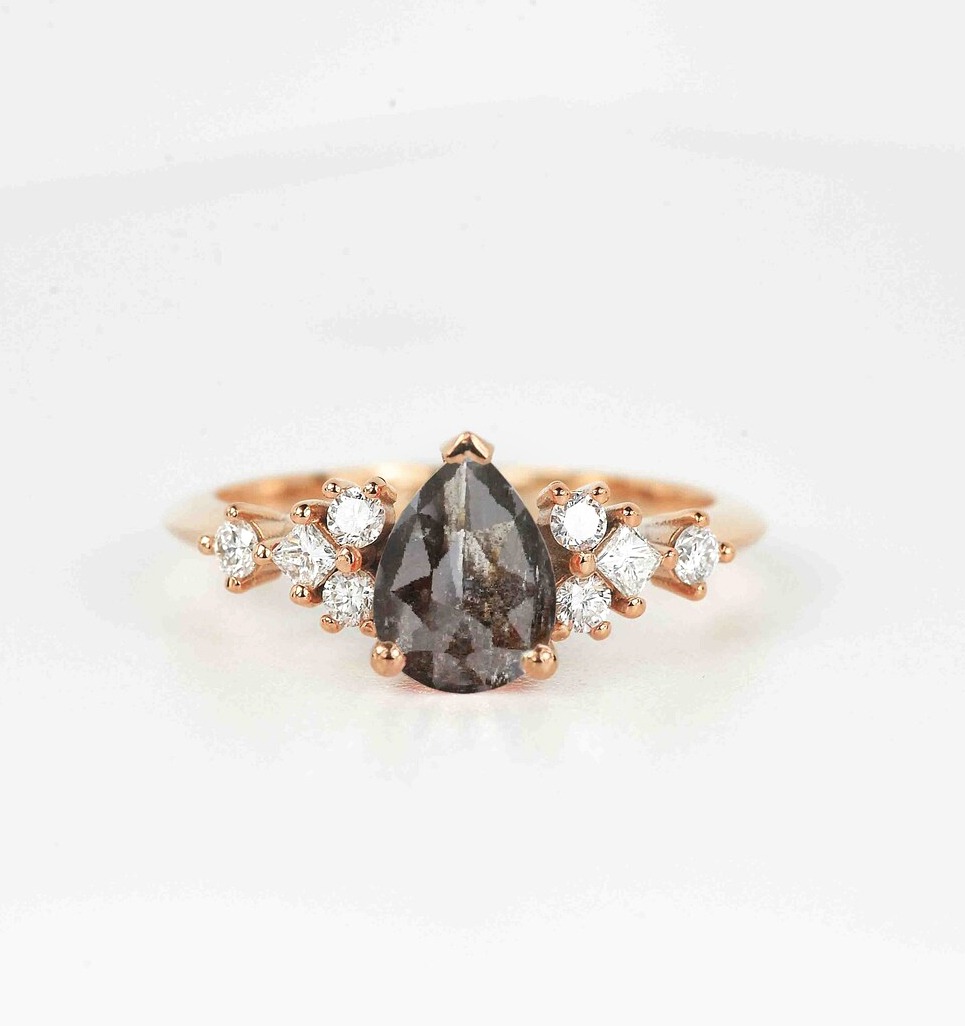 pear cut salt and pepper diamond ring with white accent diamonds. This unique art deco ring comes with solid 9k,14k or 18k rose gold.