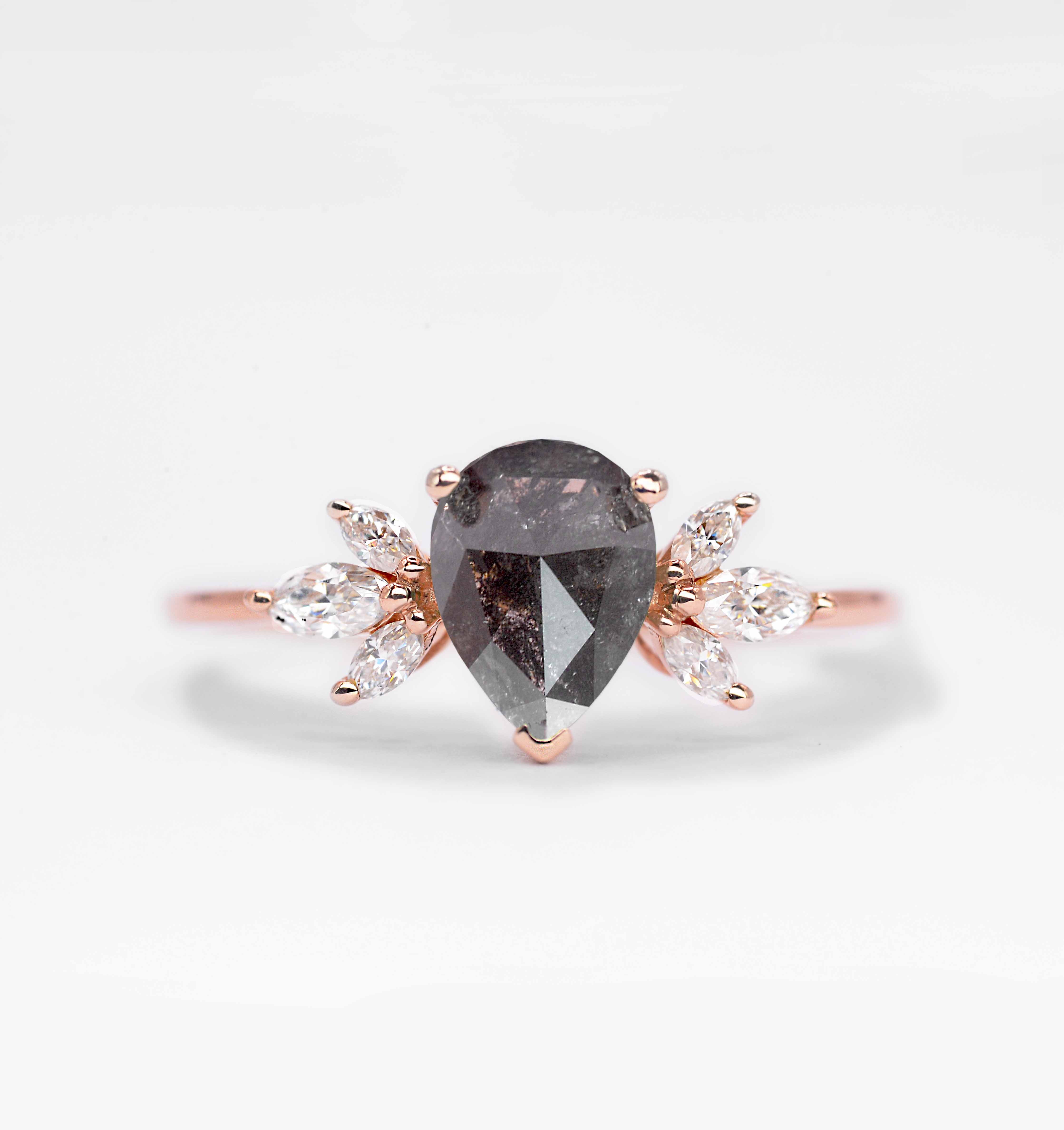 1.5ct salt and pepper modern ring with 8 x 6mm peat cut salt and pepper diamond and white marquise diamonds. The unique design of this art deco style ring comes with solid 9k,14k or 18k gold or platinum.