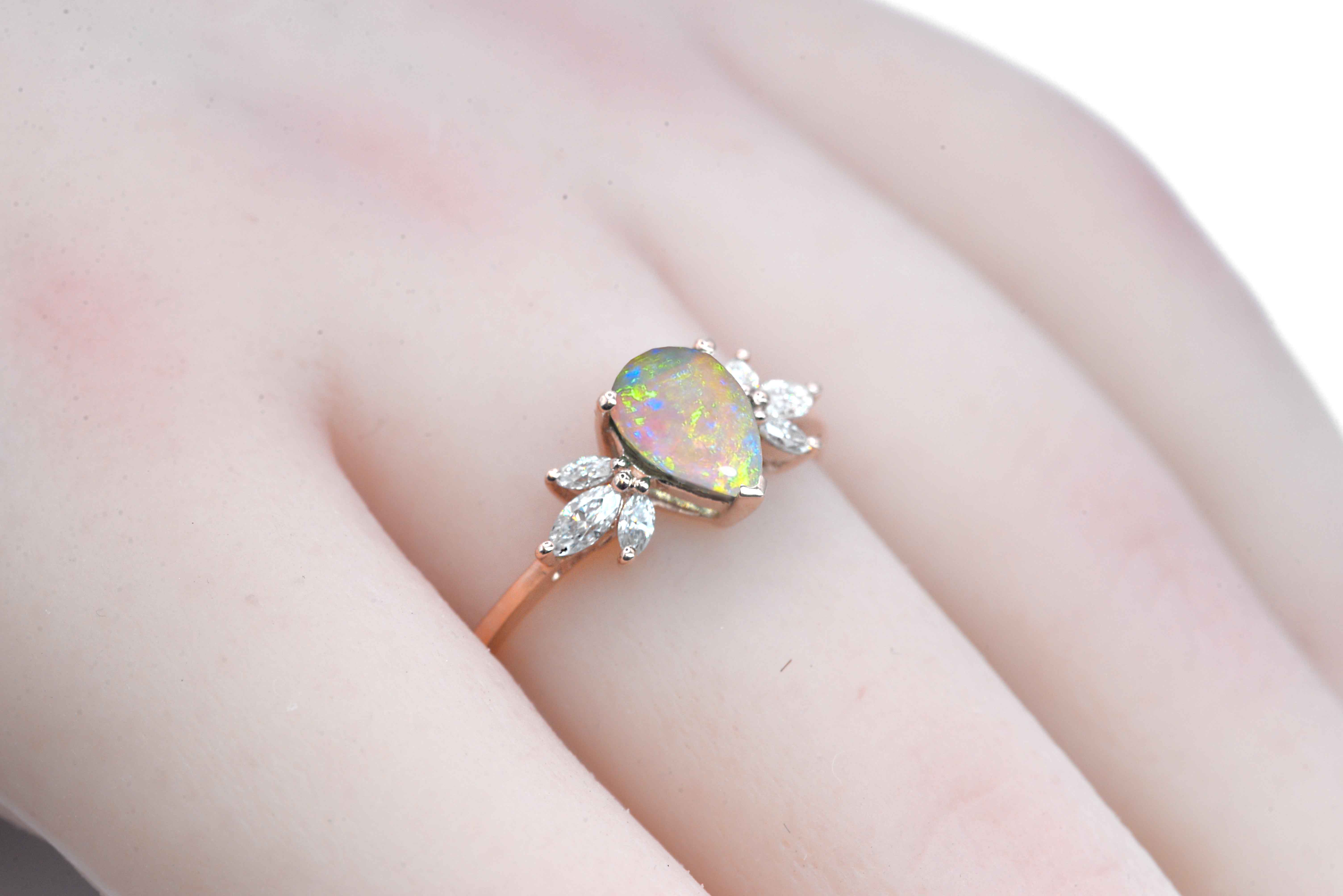 opal and marquise diamond cluster ring with opal and white diamonds. This unique art deco ring comes with solid 9k,14k or 18k rose gold.