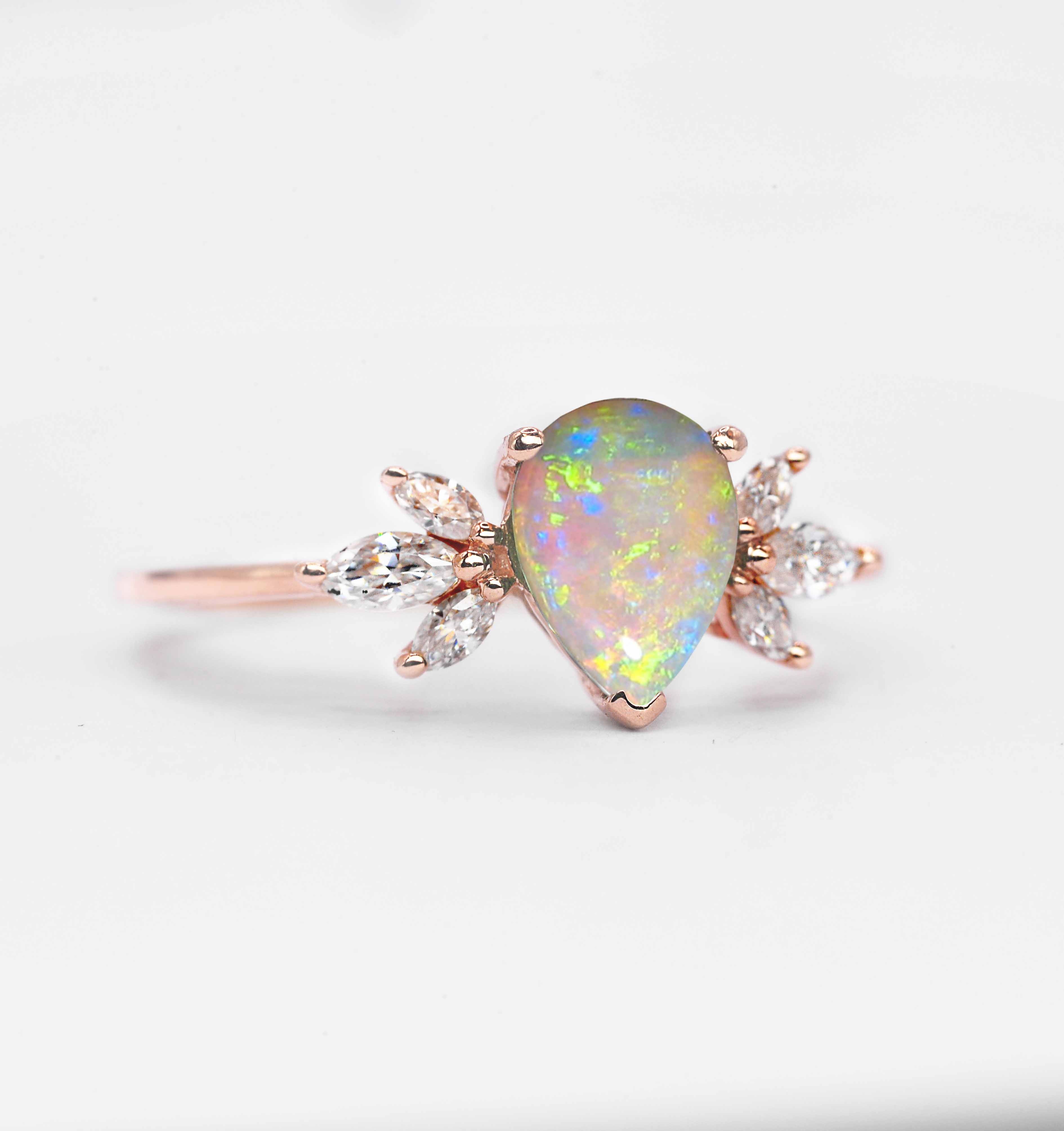 opal and marquise diamond cluster ring with opal and white diamonds. This unique art deco ring comes with solid 9k,14k or 18k rose gold.