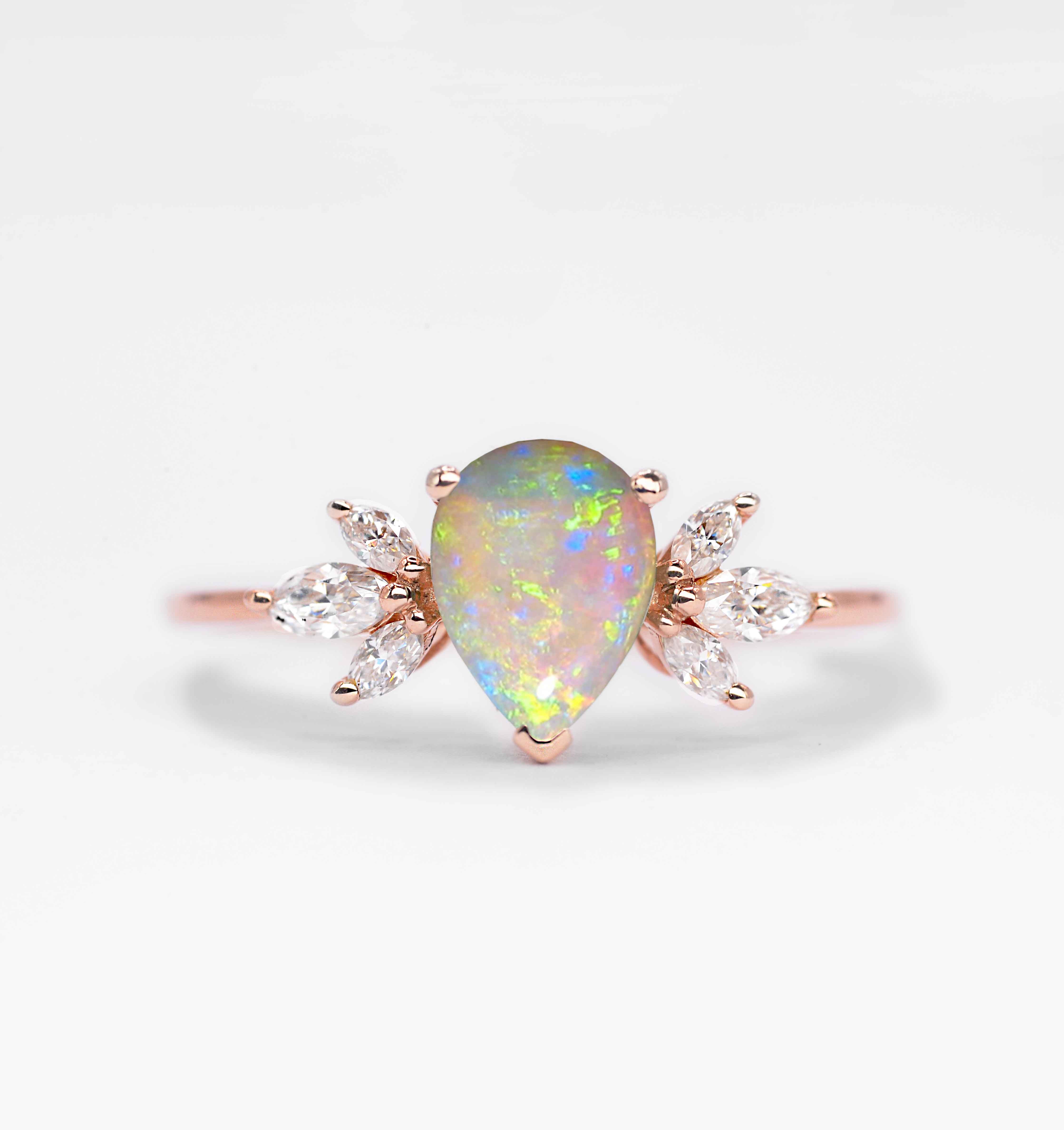 opal and marquise diamond cluster ring with opal and white diamonds. This unique art deco ring comes with solid 9k,14k or 18k rose gold.