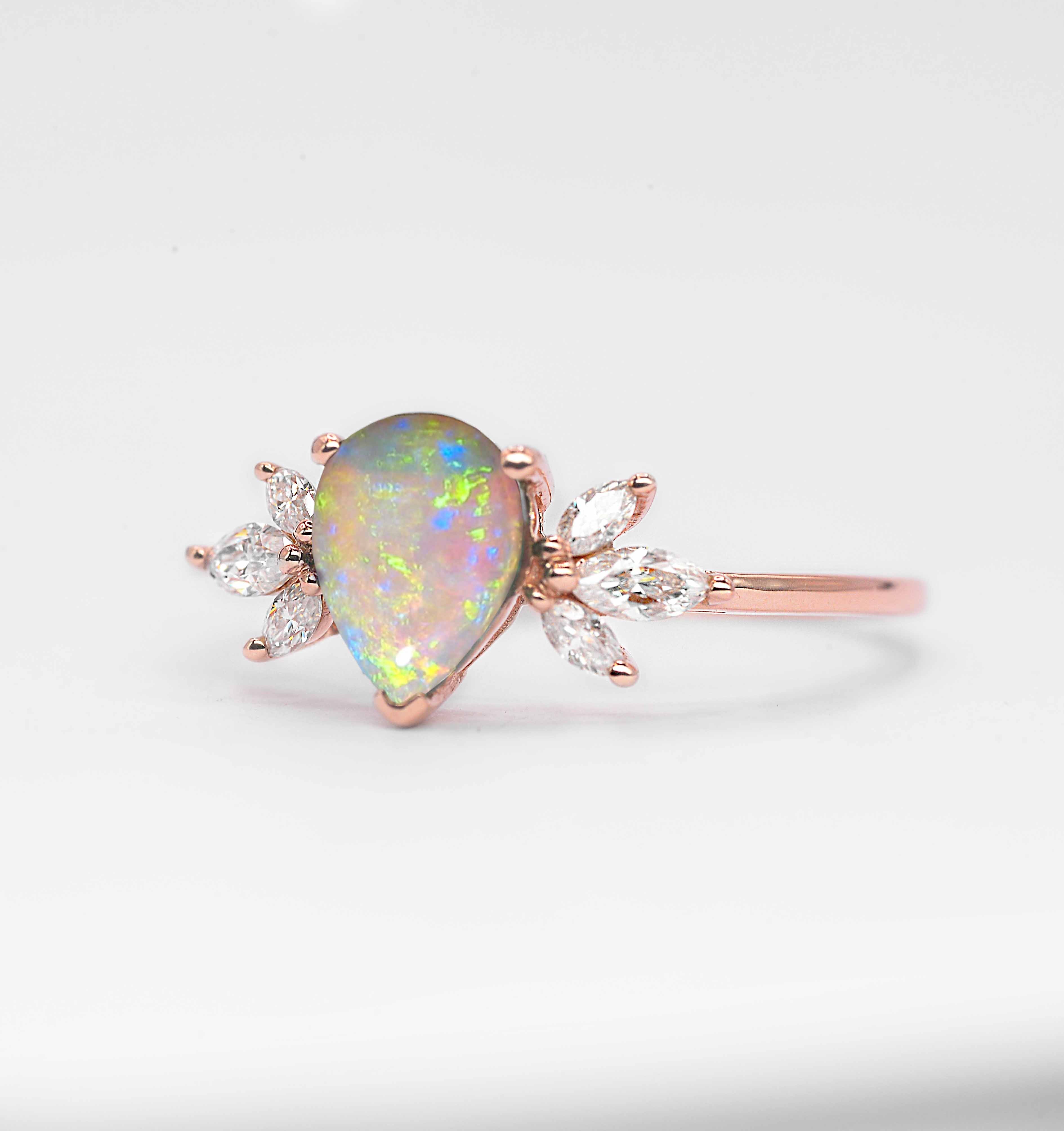 opal and marquise diamond cluster ring with opal and white diamonds. This unique art deco ring comes with solid 9k,14k or 18k rose gold.