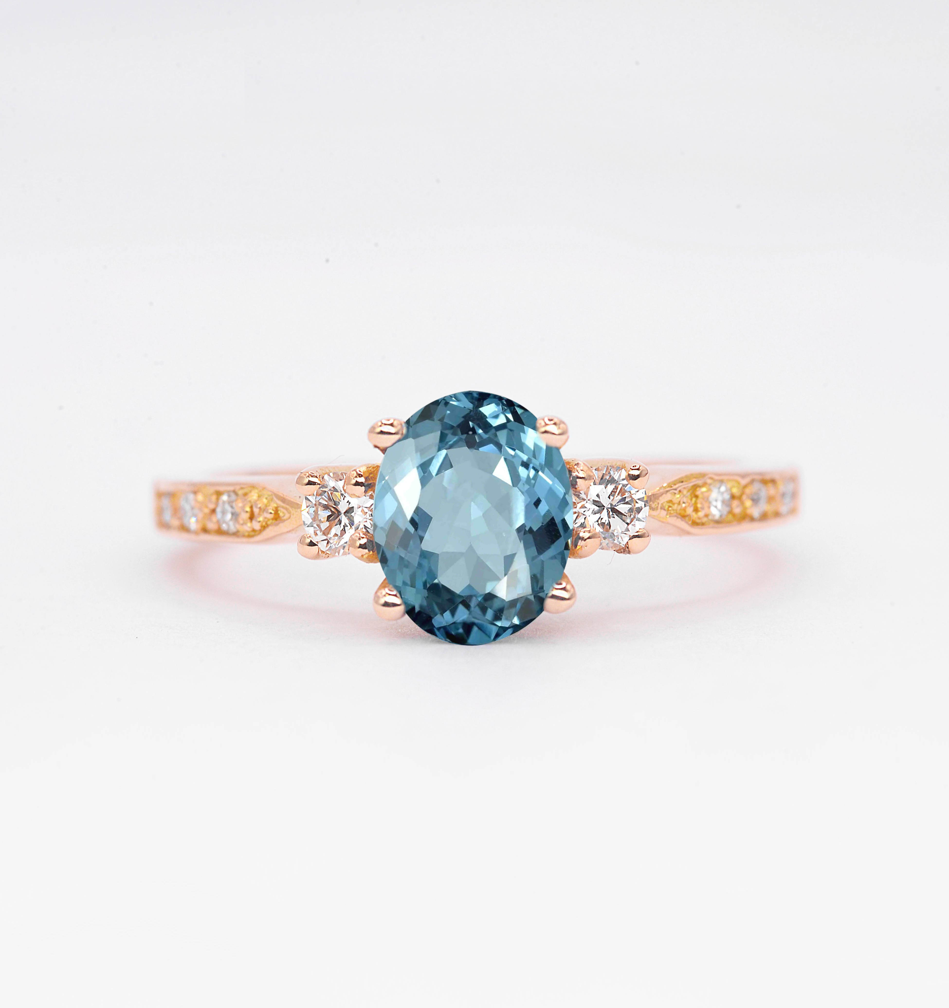 Oval aquamarine and diamond ring
