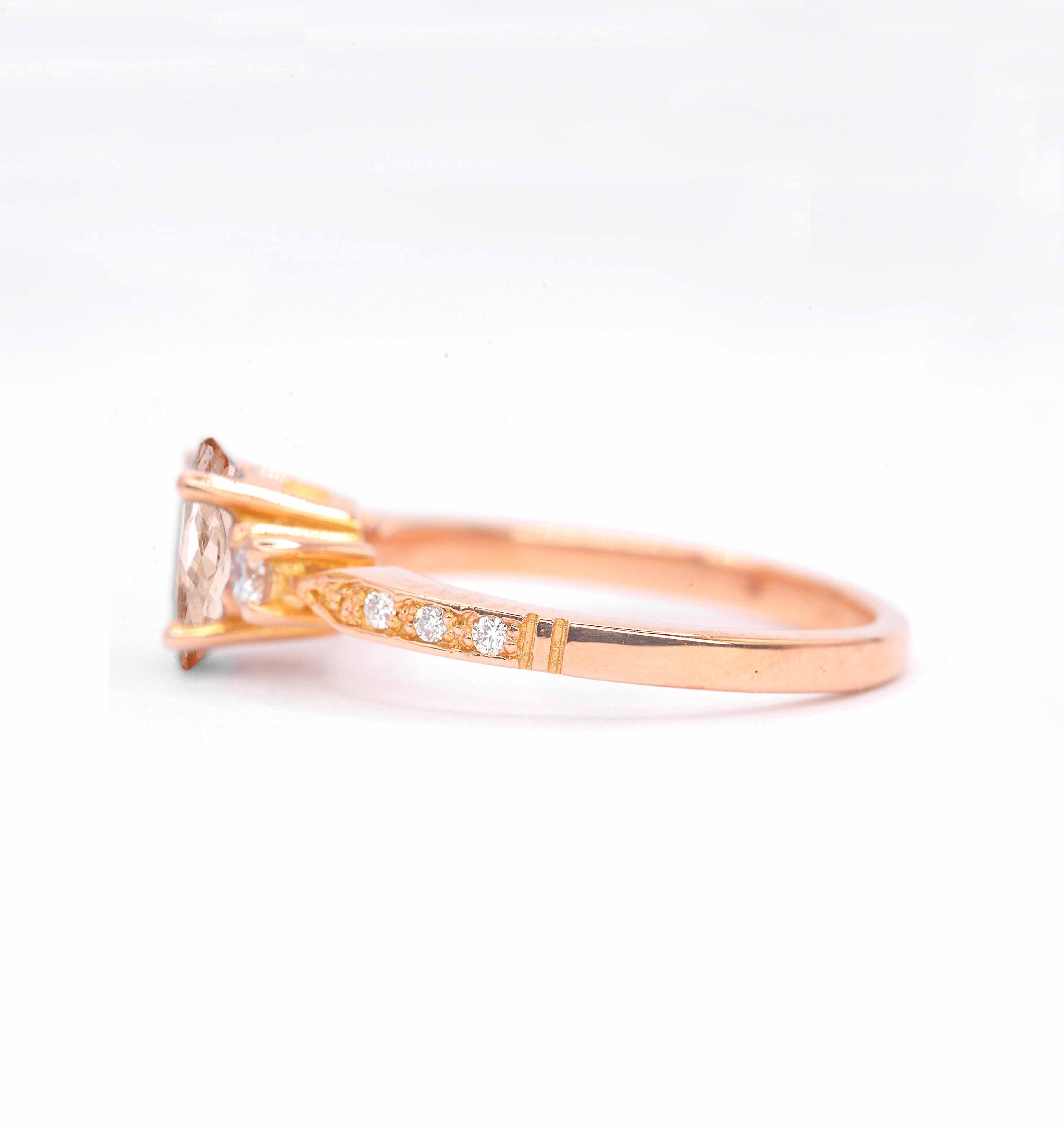 Natural morganite and diamond ring with 8 x 6mm oval cut morganite and white round diamonds. The unique design of this art deco style ring comes with solid 9k,14k or 18k gold or platinum.