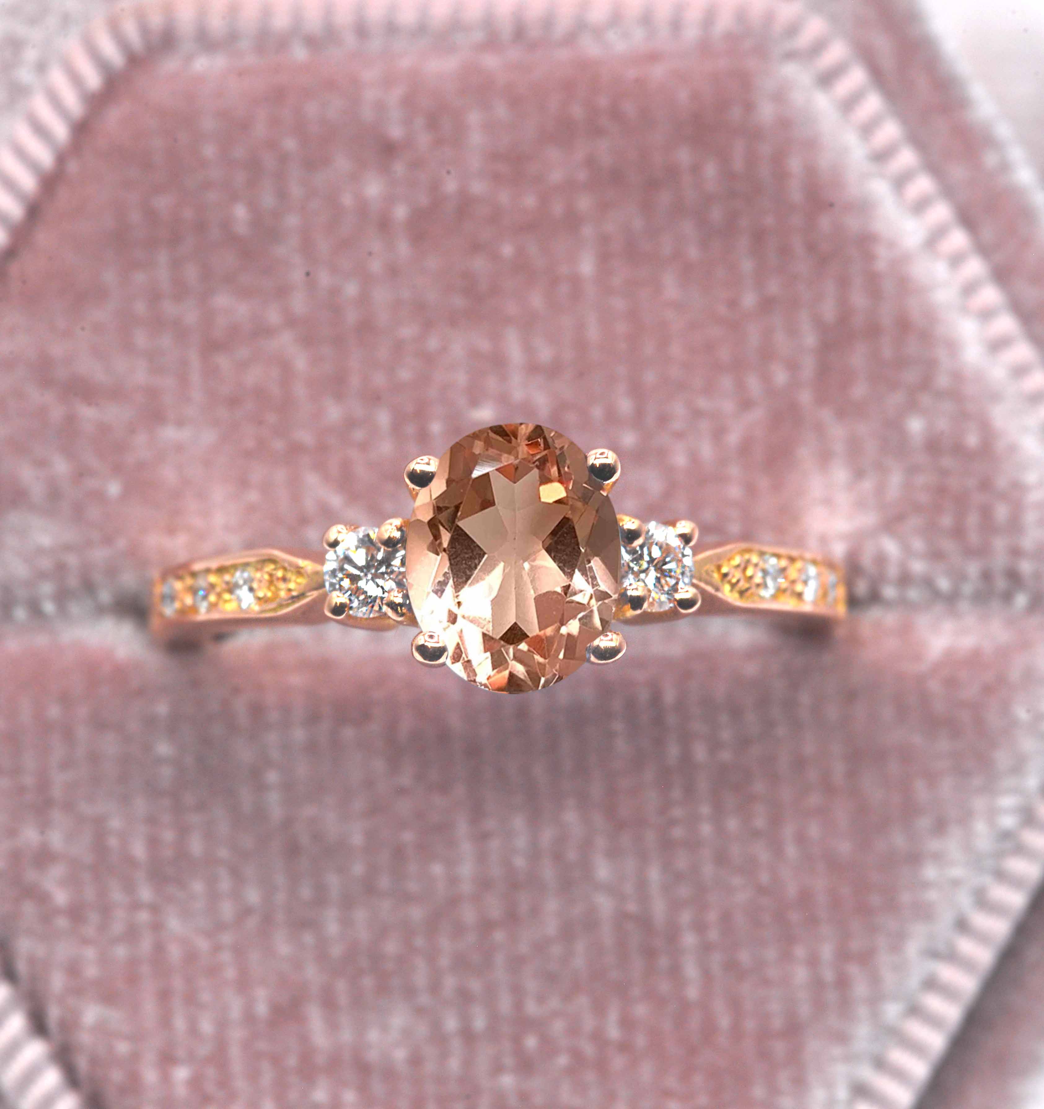 Natural morganite and diamond ring with 8 x 6mm oval cut morganite and white round diamonds. The unique design of this art deco style ring comes with solid 9k,14k or 18k gold or platinum.