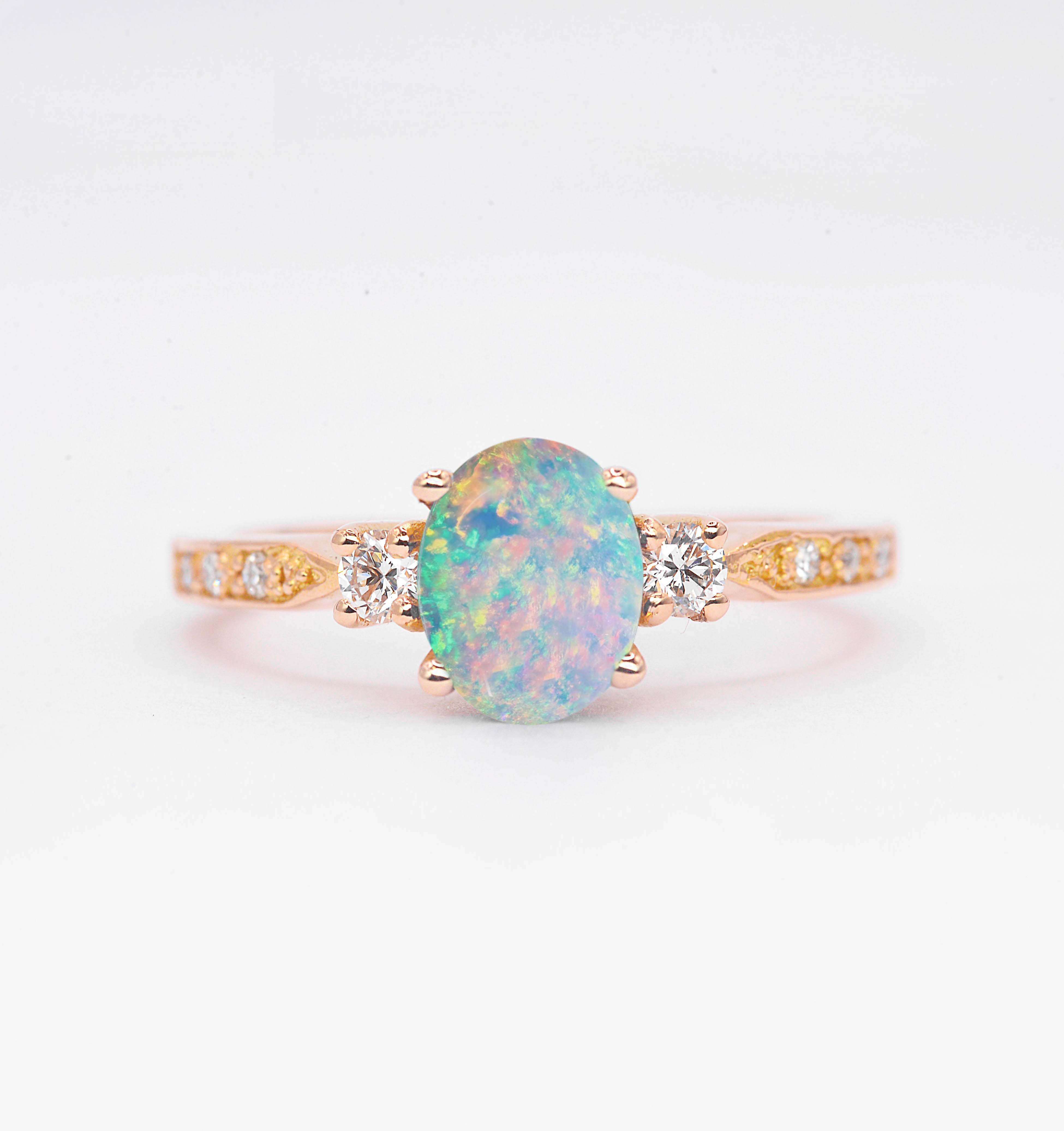 Oval Opal And Diamond Celtic Solitaire Ring