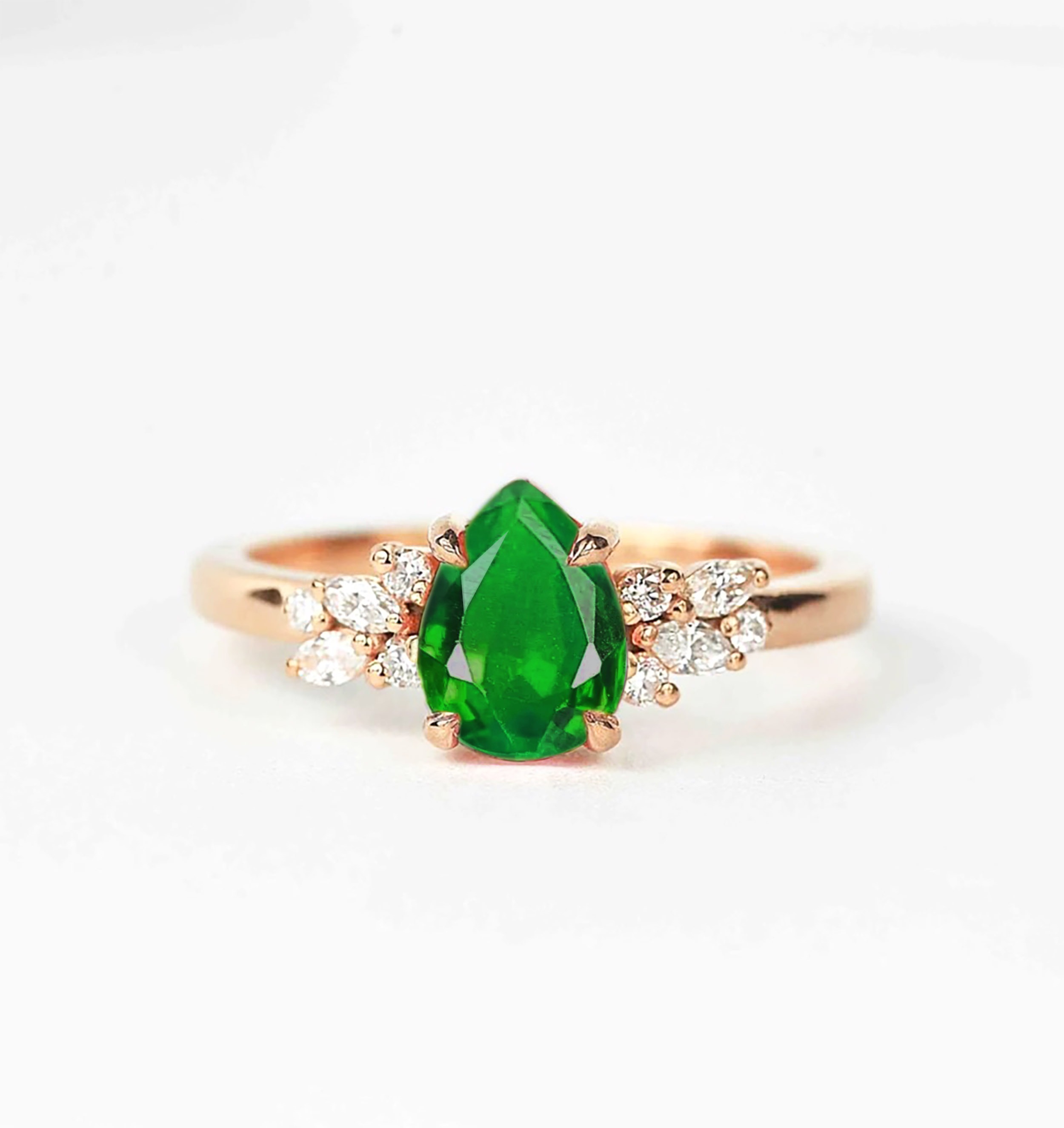 Pear cut tsavorite engagement ring
