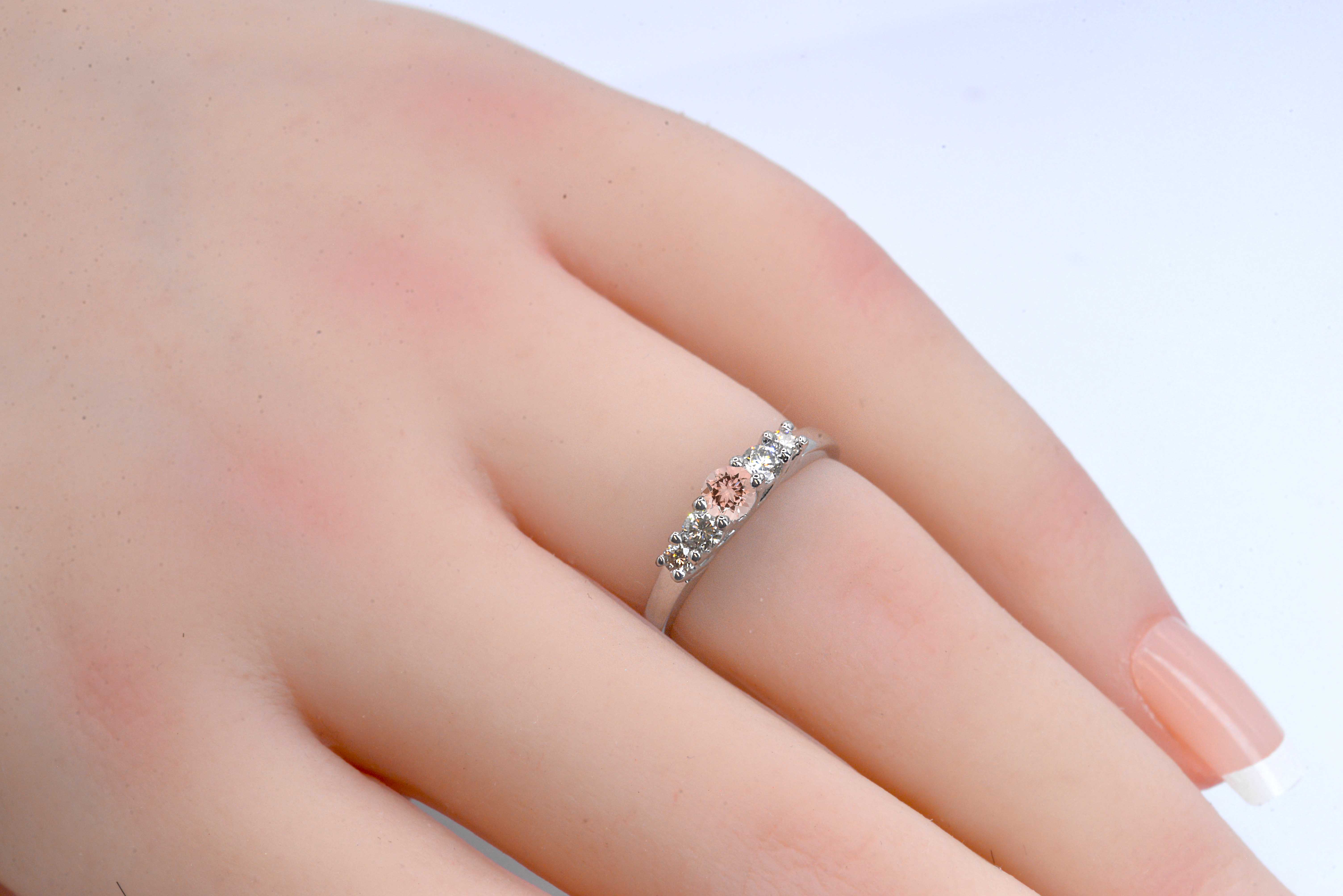4mm morganite and diamond ring with 4.5mm round morganite and white diamonds. The unique art deco style ring comes with solid 9k,14k or 18k gold or platinum.