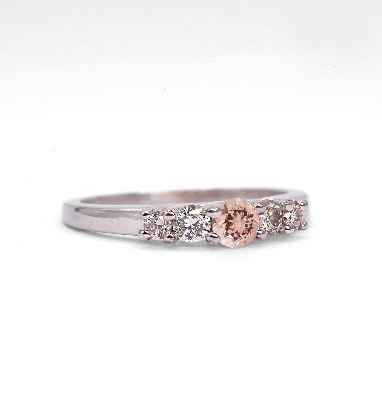 4mm morganite and diamond ring with 4.5mm round morganite and white diamonds. The unique art deco style ring comes with solid 9k,14k or 18k gold or platinum.