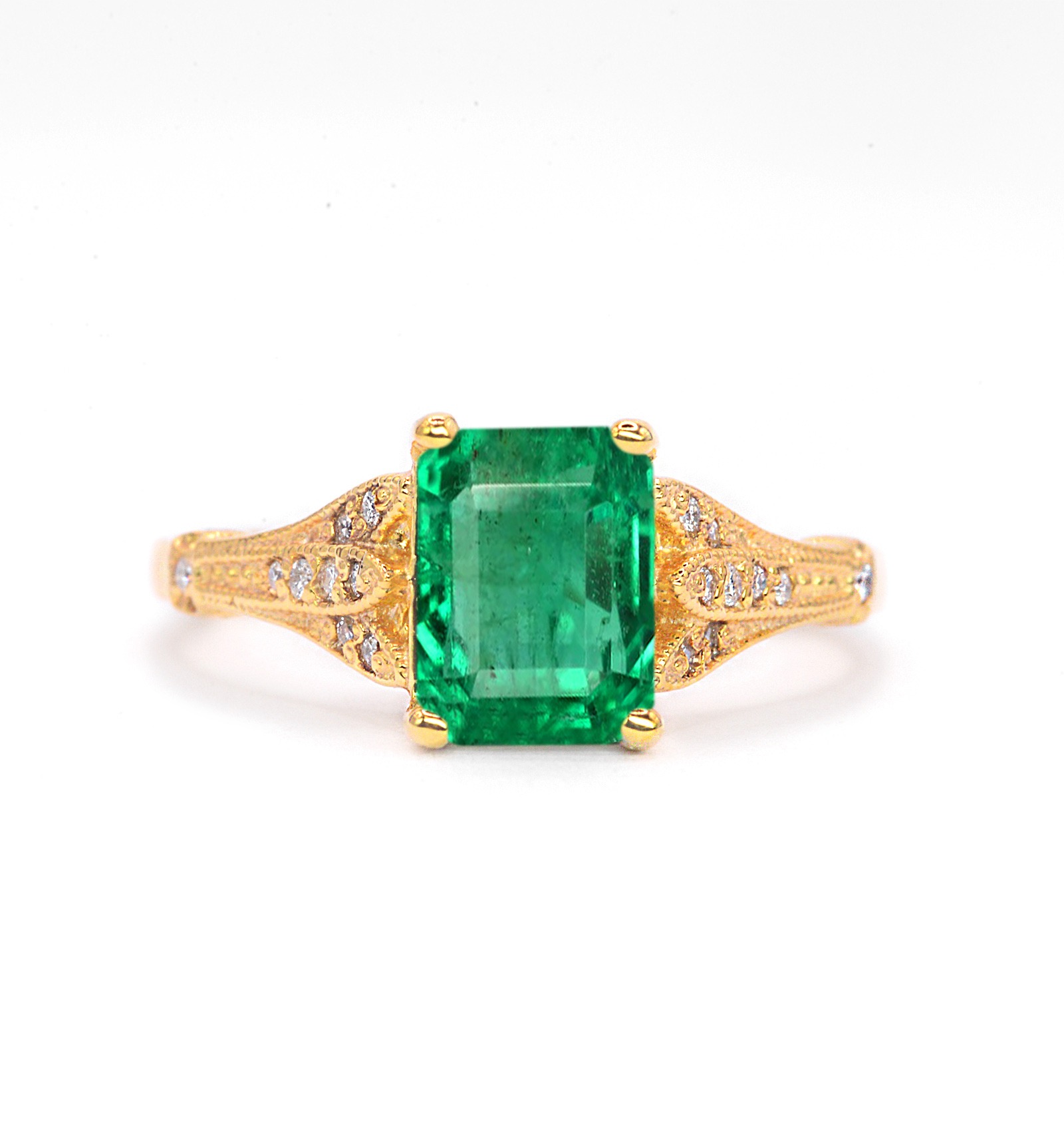 1.51ct emerald and diamond ring with 8 x 6mm emerald cut emerald and white diamonds. The unique and elegant ring comes with solid 9k,14k or 18k gold or platinum.