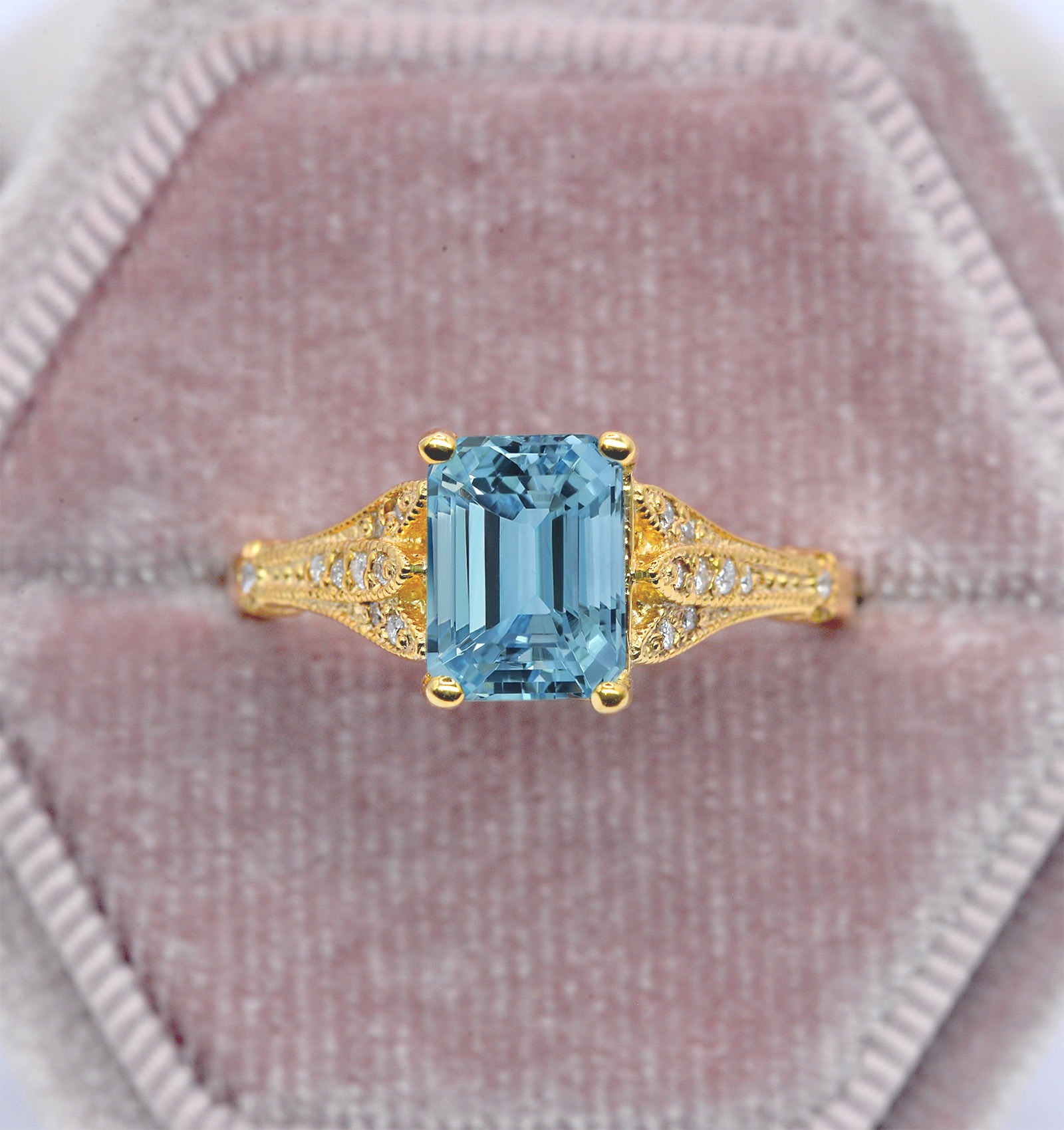 This emerald cut aquamarine vintage ring is a beautiful and elegant choice for engagement or any other occasion. Available in rose gold, yellow gold, white gold, or platinum.
