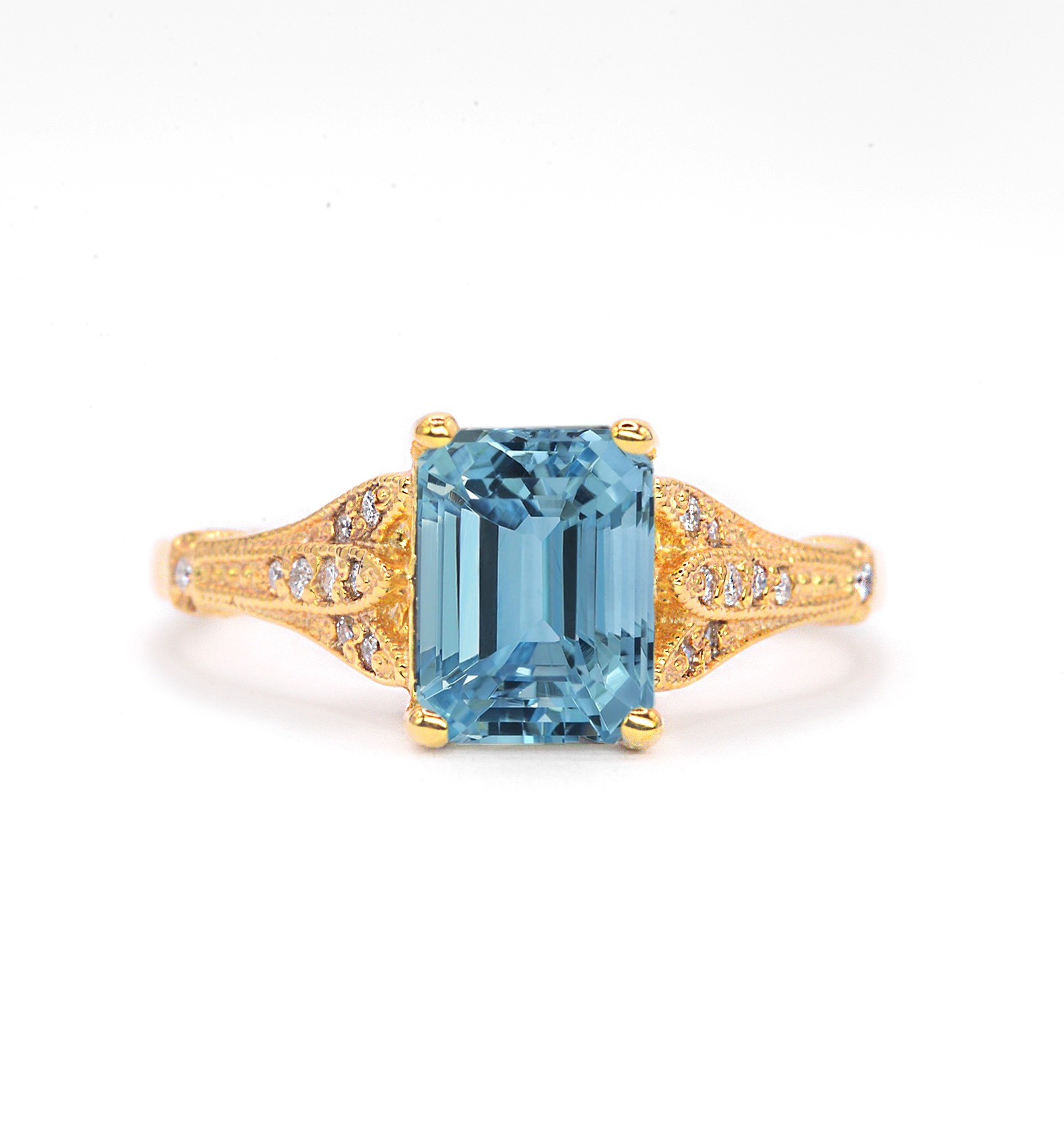 This emerald cut aquamarine vintage ring is a beautiful and elegant choice for engagement or any other occasion. Available in rose gold, yellow gold, white gold, or platinum.