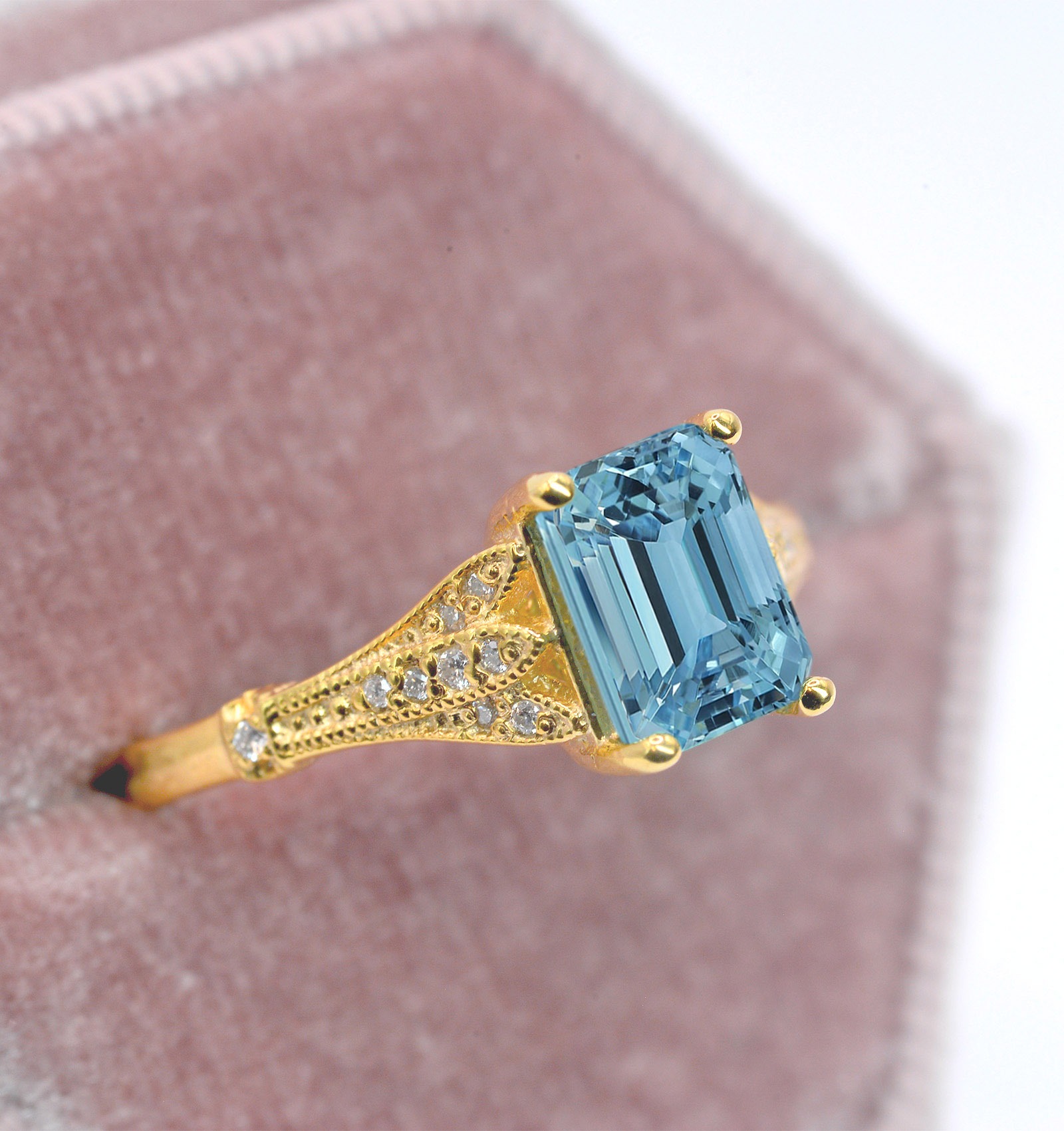 This emerald cut aquamarine vintage ring is a beautiful and elegant choice for engagement or any other occasion. Available in rose gold, yellow gold, white gold, or platinum.