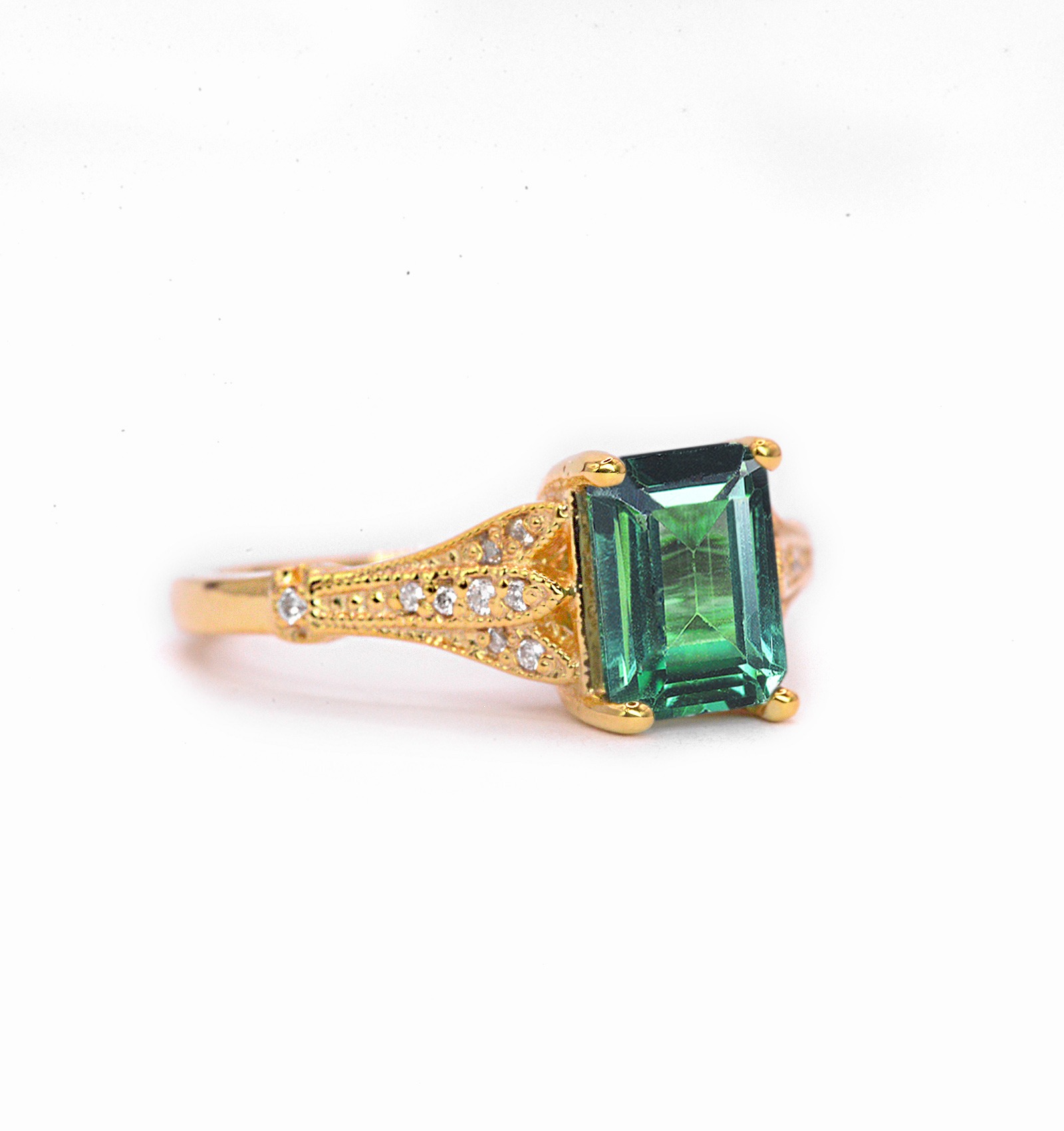 Mint green sapphire vintage ring with 8 x 6mm emerald cut mint green sapphire and white diamonds. The unique and elegant ring comes with solid 9k,14k or 18k gold or platinum.