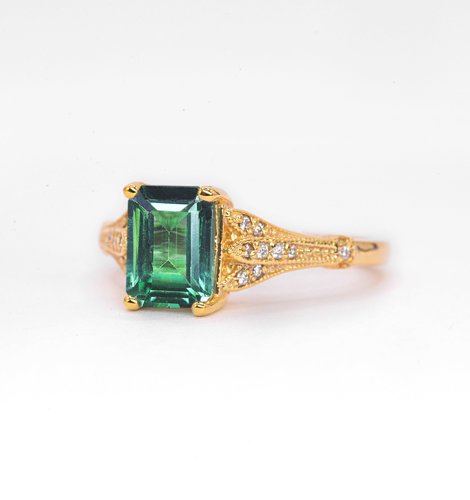 Mint green sapphire vintage ring with 8 x 6mm emerald cut mint green sapphire and white diamonds. The unique and elegant ring comes with solid 9k,14k or 18k gold or platinum.