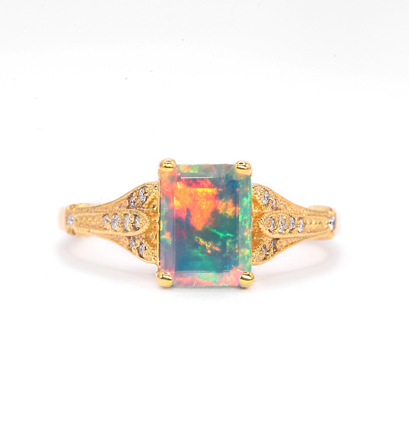 Natural opal and diamond vintage ring with 8 x 6mm natural white opal and white diamonds. The unique and elegant ring comes with solid 9k,14k or 18k gold or platinum.