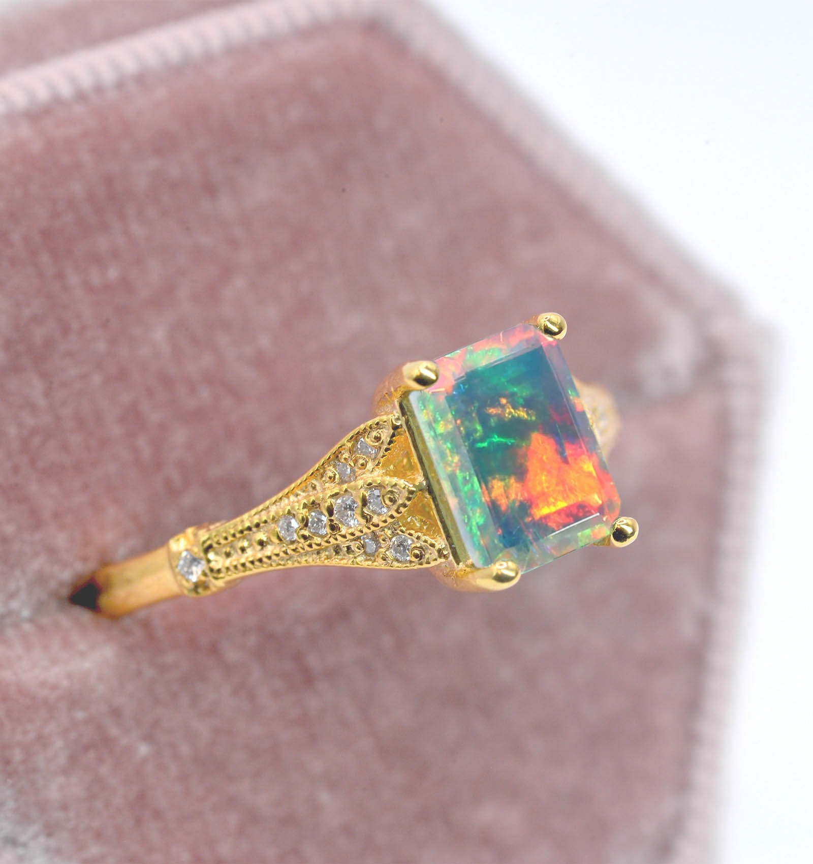 Natural opal and diamond vintage ring with 8 x 6mm natural white opal and white diamonds. The unique and elegant ring comes with solid 9k,14k or 18k gold or platinum.