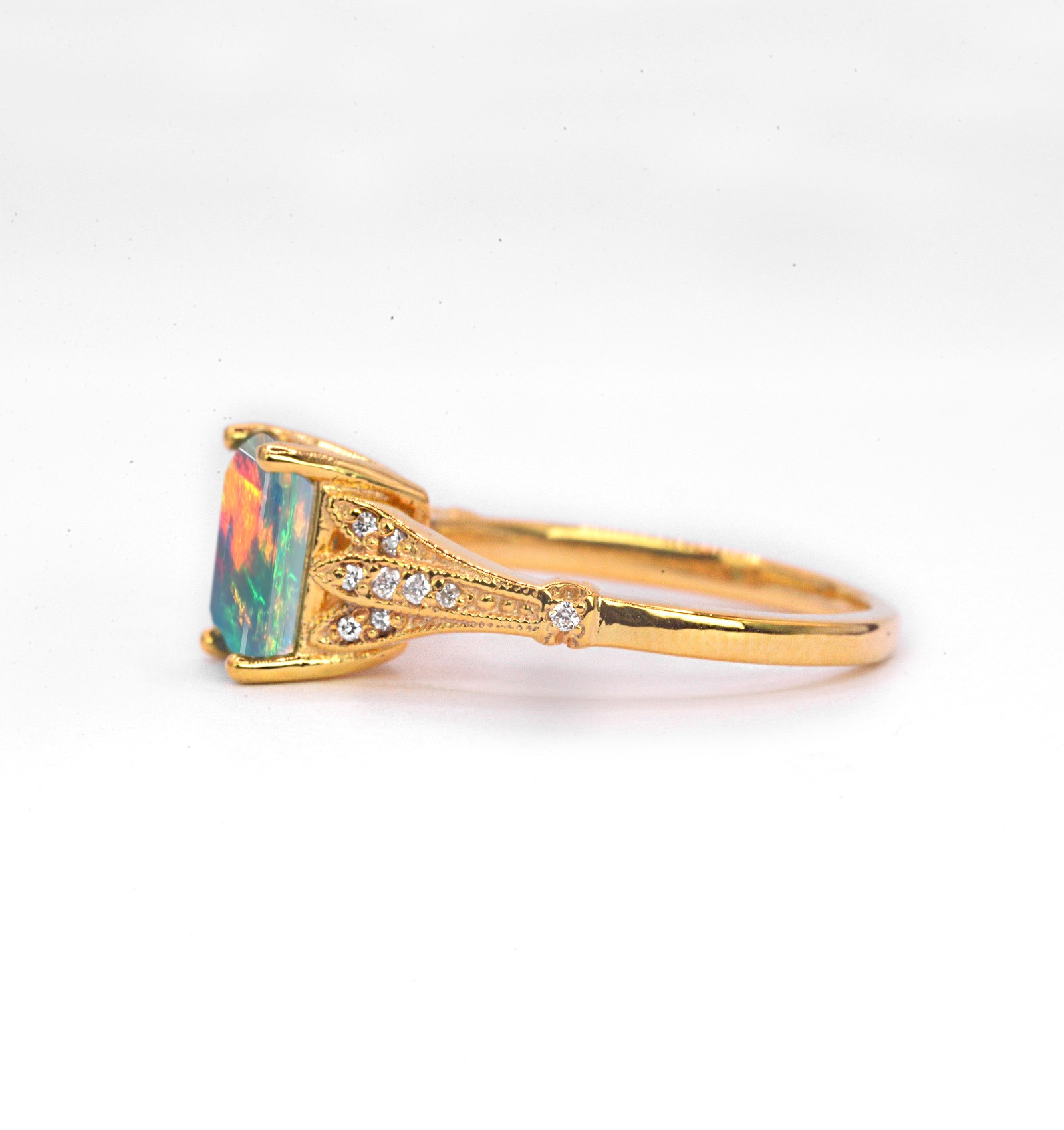 Natural opal and diamond vintage ring with 8 x 6mm natural white opal and white diamonds. The unique and elegant ring comes with solid 9k,14k or 18k gold or platinum.