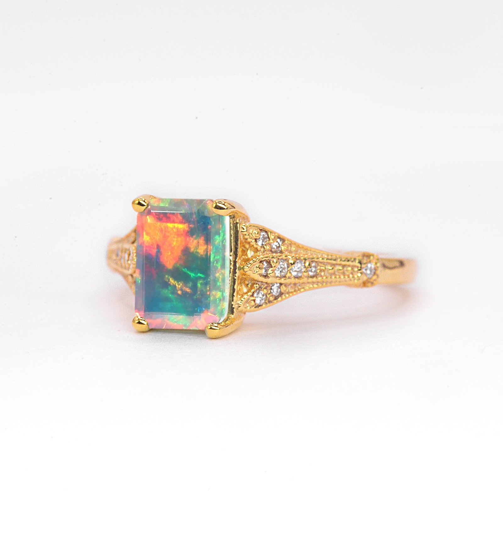 Natural opal and diamond vintage ring with 8 x 6mm natural white opal and white diamonds. The unique and elegant ring comes with solid 9k,14k or 18k gold or platinum.