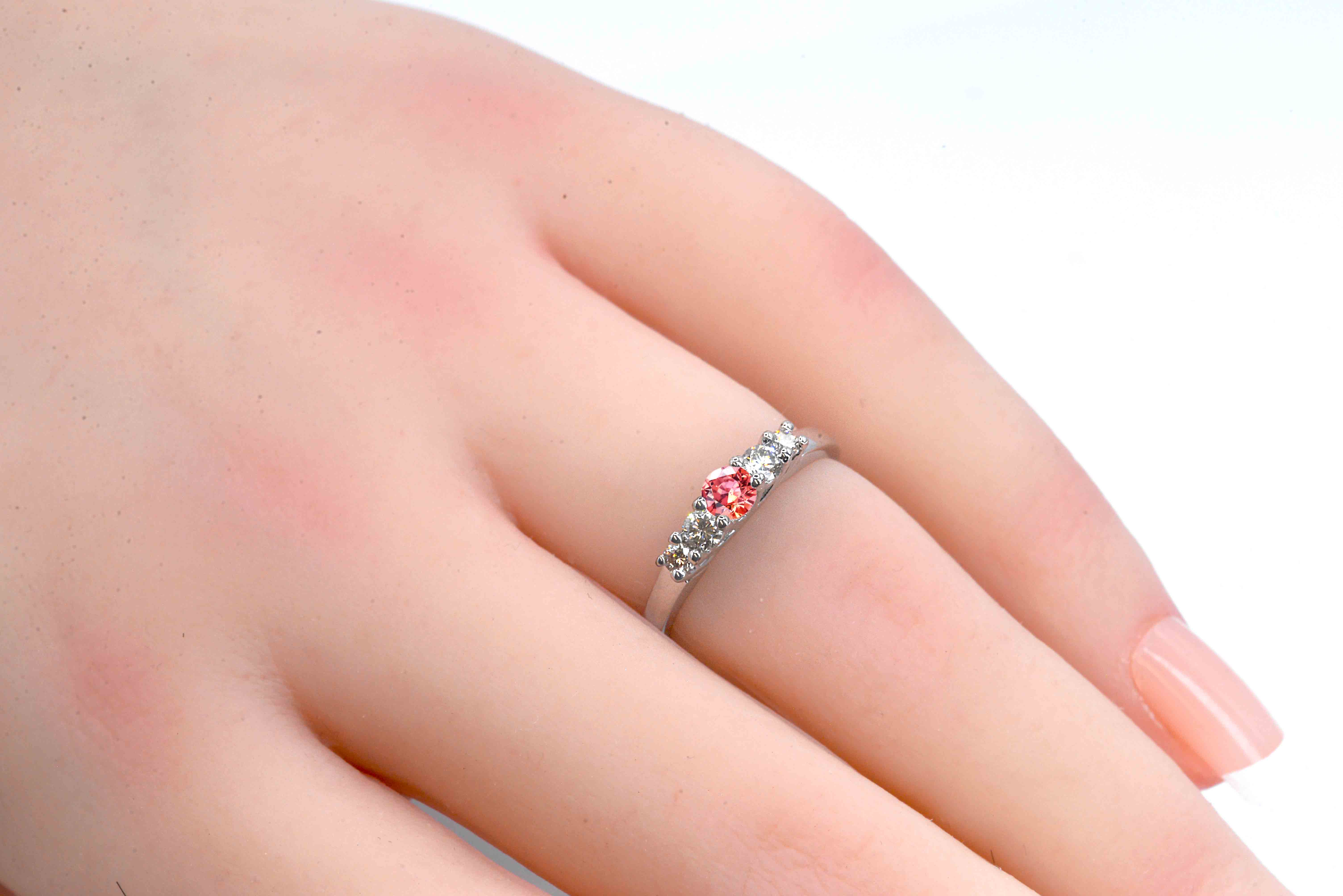 Padparadscha sapphire and diamond ring for her with padparadscha sapphire and white diamonds. This unique ring comes in 9k,14k or 18k rose gold.
