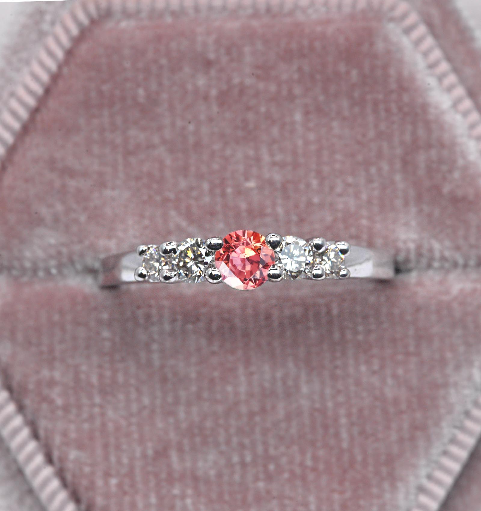 Padparadscha sapphire and diamond ring for her with padparadscha sapphire and white diamonds. This unique ring comes in 9k,14k or 18k rose gold.