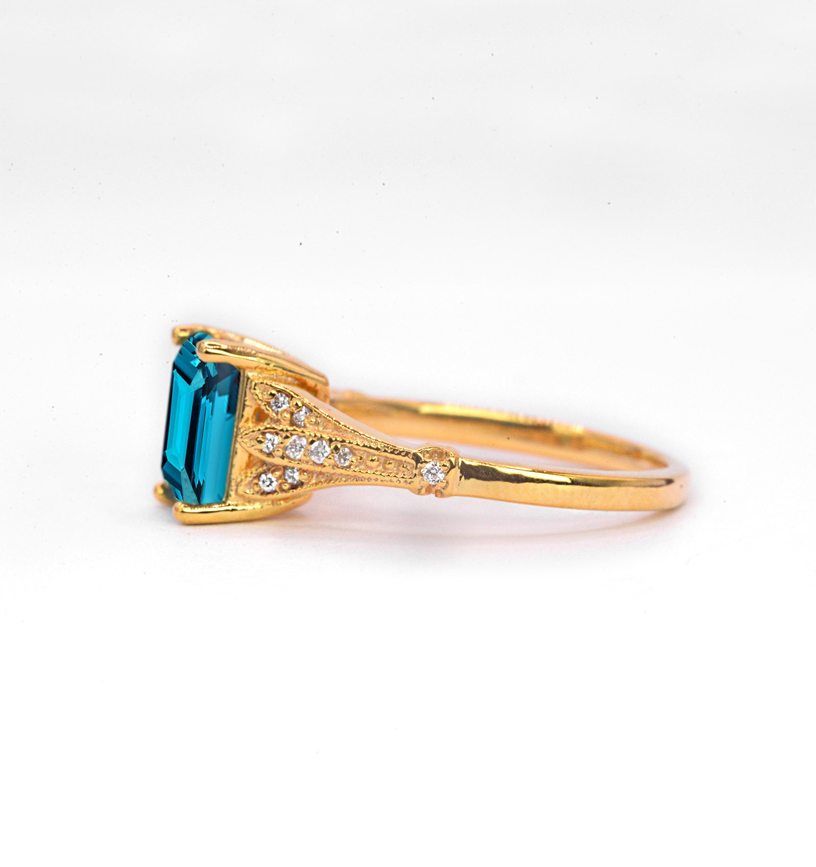 Emerald cut blue topaz and diamond ring for wife. This unique bespoke engagement ring comes with any solid 9k,14k or 18k gold or platinum.