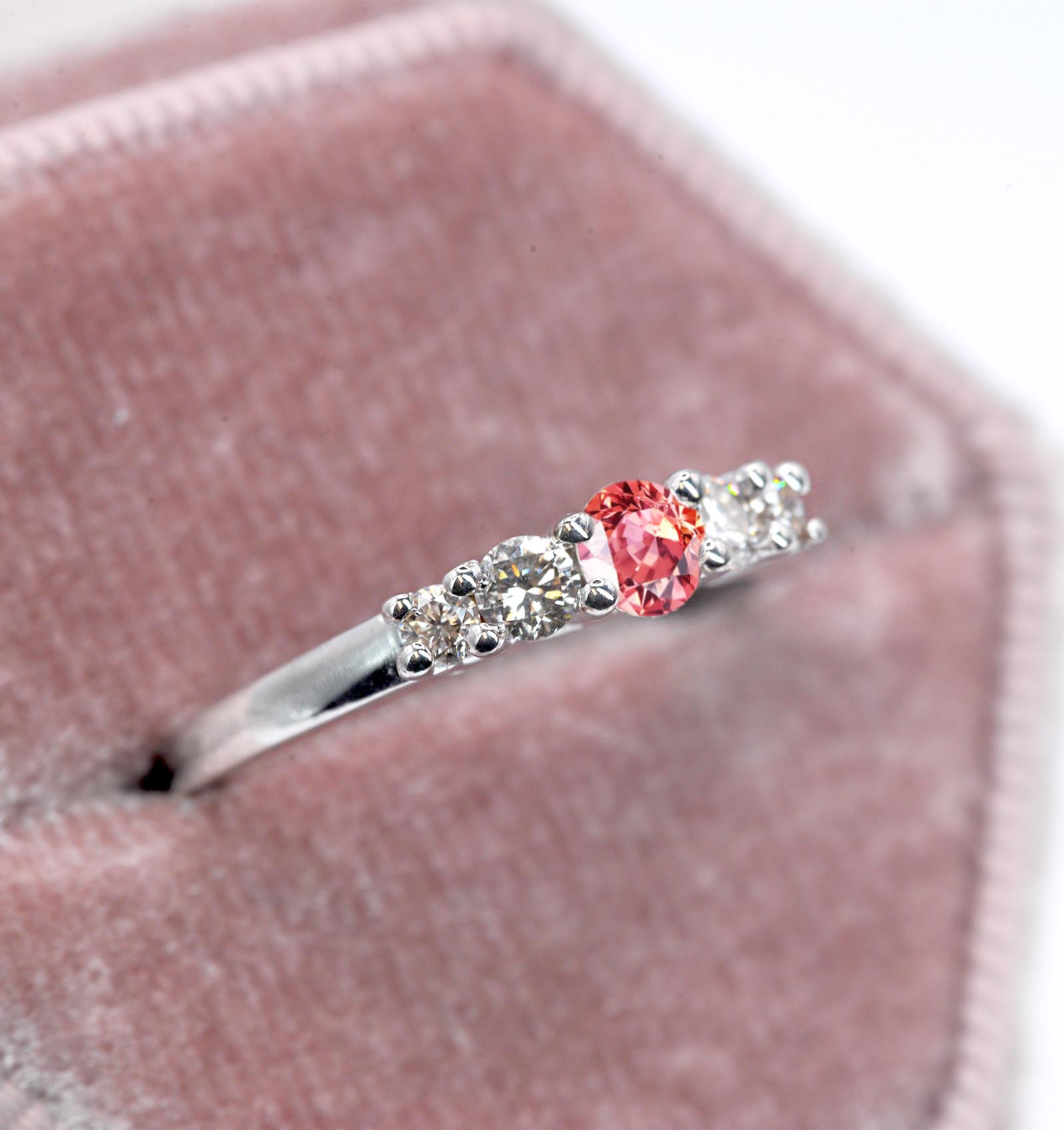 Padparadscha sapphire and diamond ring for her with padparadscha sapphire and white diamonds. This unique ring comes in 9k,14k or 18k rose gold.