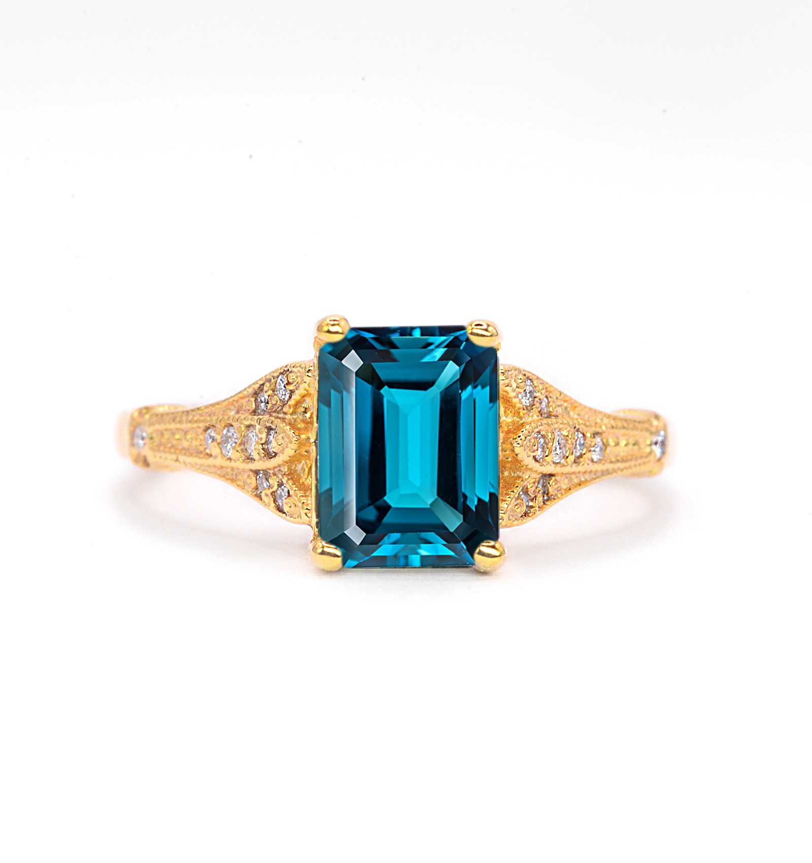 Emerald cut blue topaz and diamond ring for wife. This unique bespoke engagement ring comes with any solid 9k,14k or 18k gold or platinum.