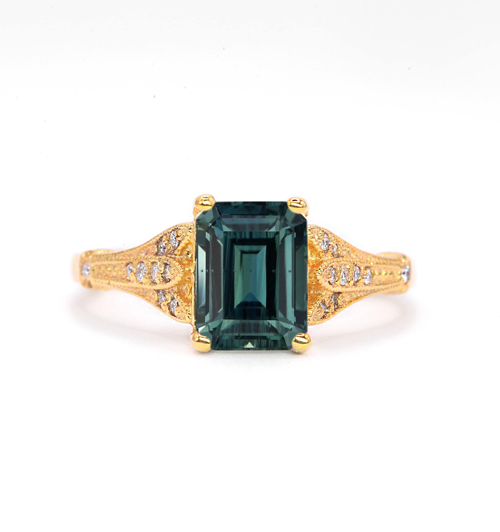 Montana sapphire art deco ring with 8 x 6mm natural Montana teal sapphire and white diamonds. The unique and elegant ring comes with solid 9k,14k or 18k gold or platinum.