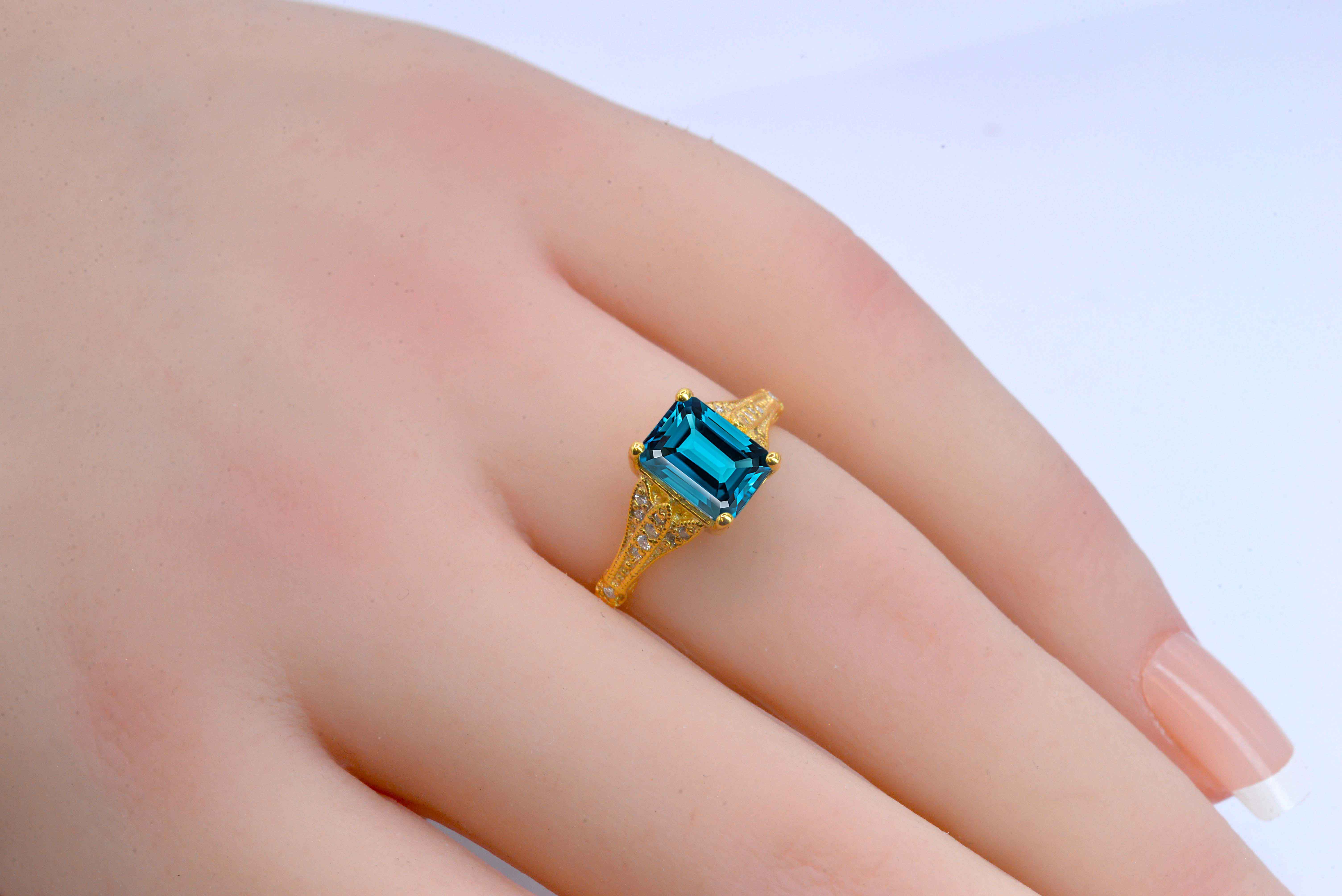 Emerald cut blue topaz and diamond ring for wife. This unique bespoke engagement ring comes with any solid 9k,14k or 18k gold or platinum.