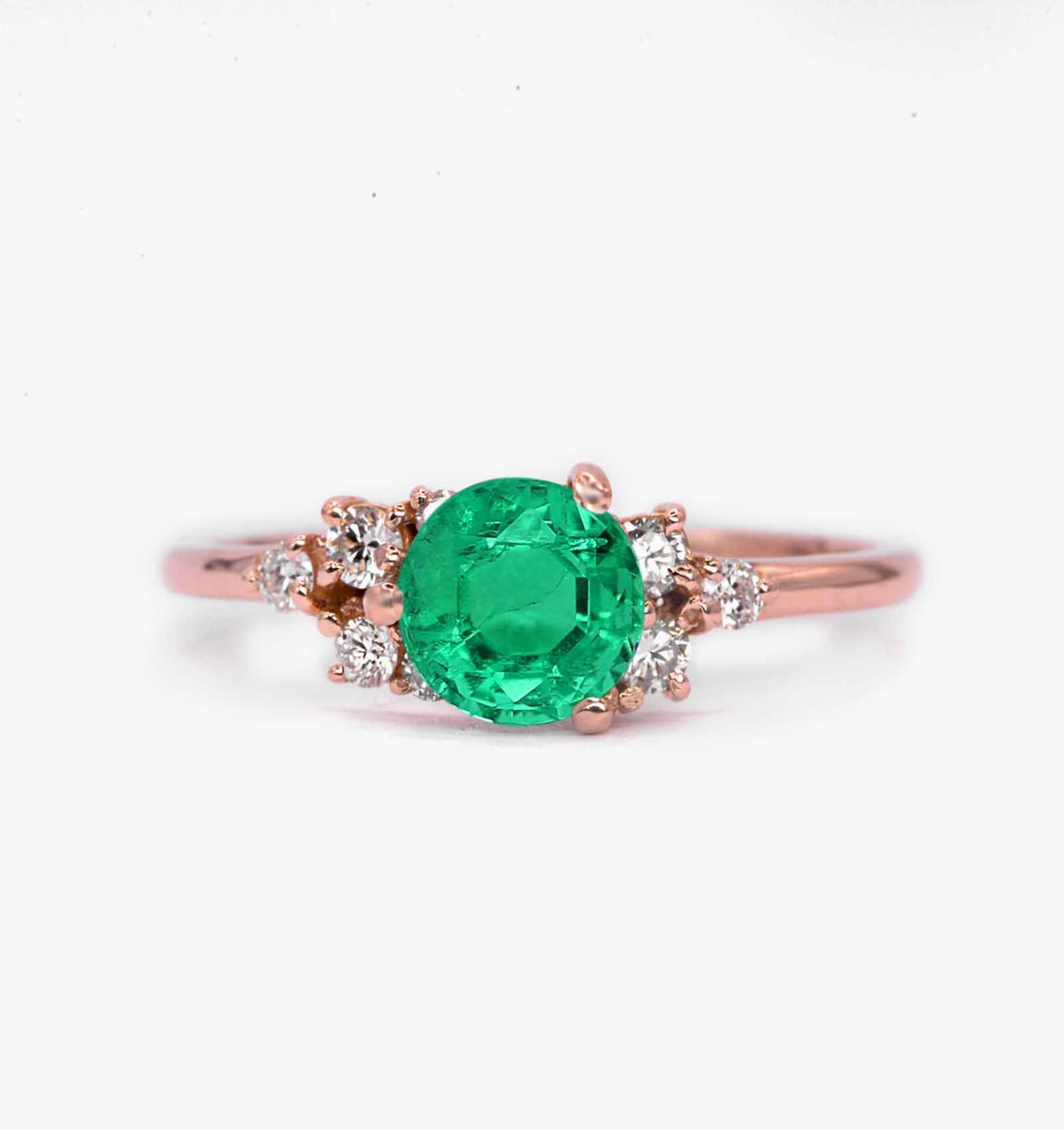 Green emerald featuring art deco engagement ring with 6mm emerald and white diamonds. The unique and elegant ring comes with solid 9k,14k or 18k gold or platinum.